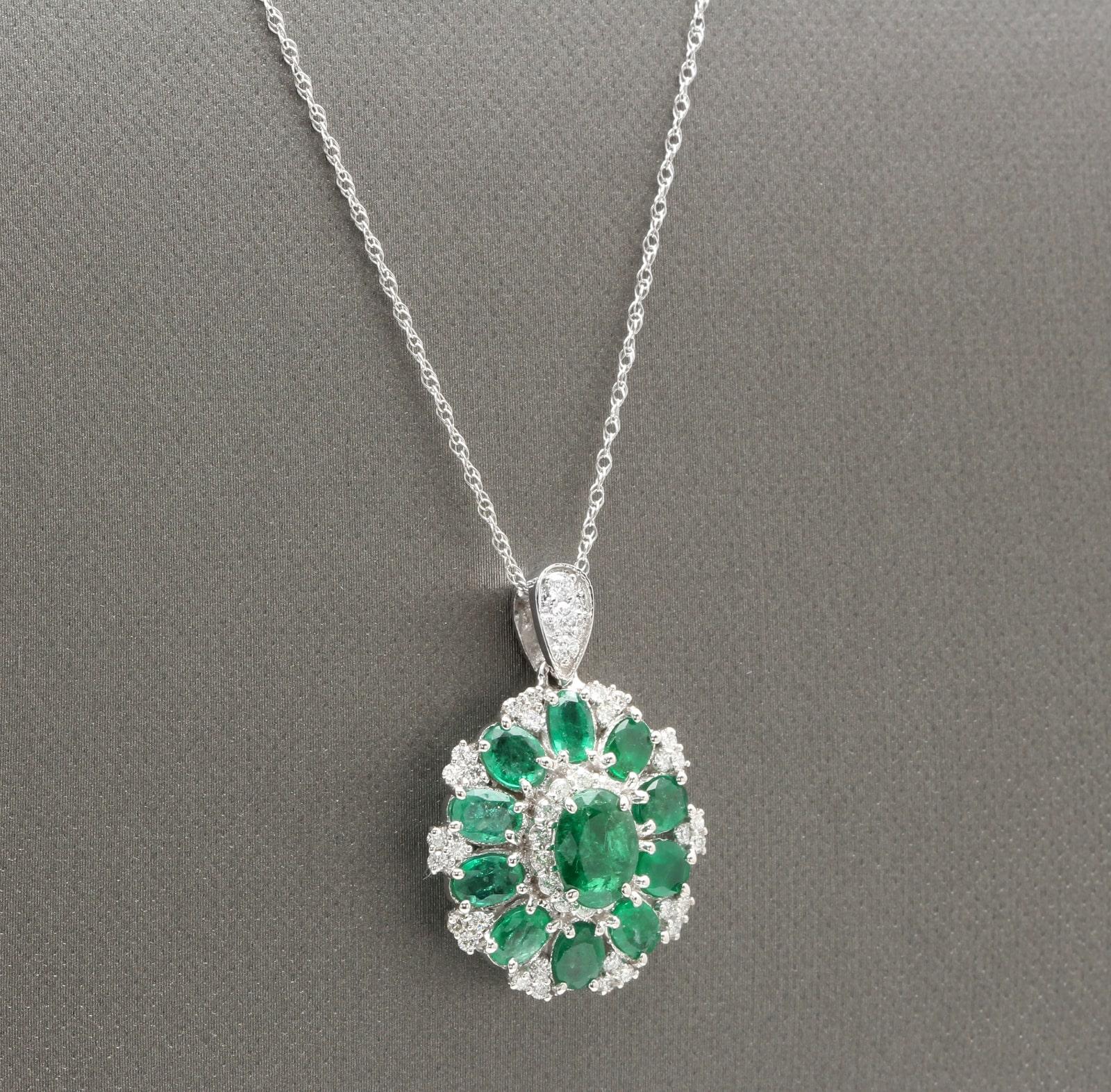 4.10Ct Natural Emerald and Diamond 14K Solid White Gold Necklace

Amazing looking piece! 

Stamped: 14K

Suggested Replacement Value: $6,000.00 

Total Natural Emeralds Weight is: Approx. 3.60 Carats

Center Emerald Measures: Approx. 8.00 x 6.00mm