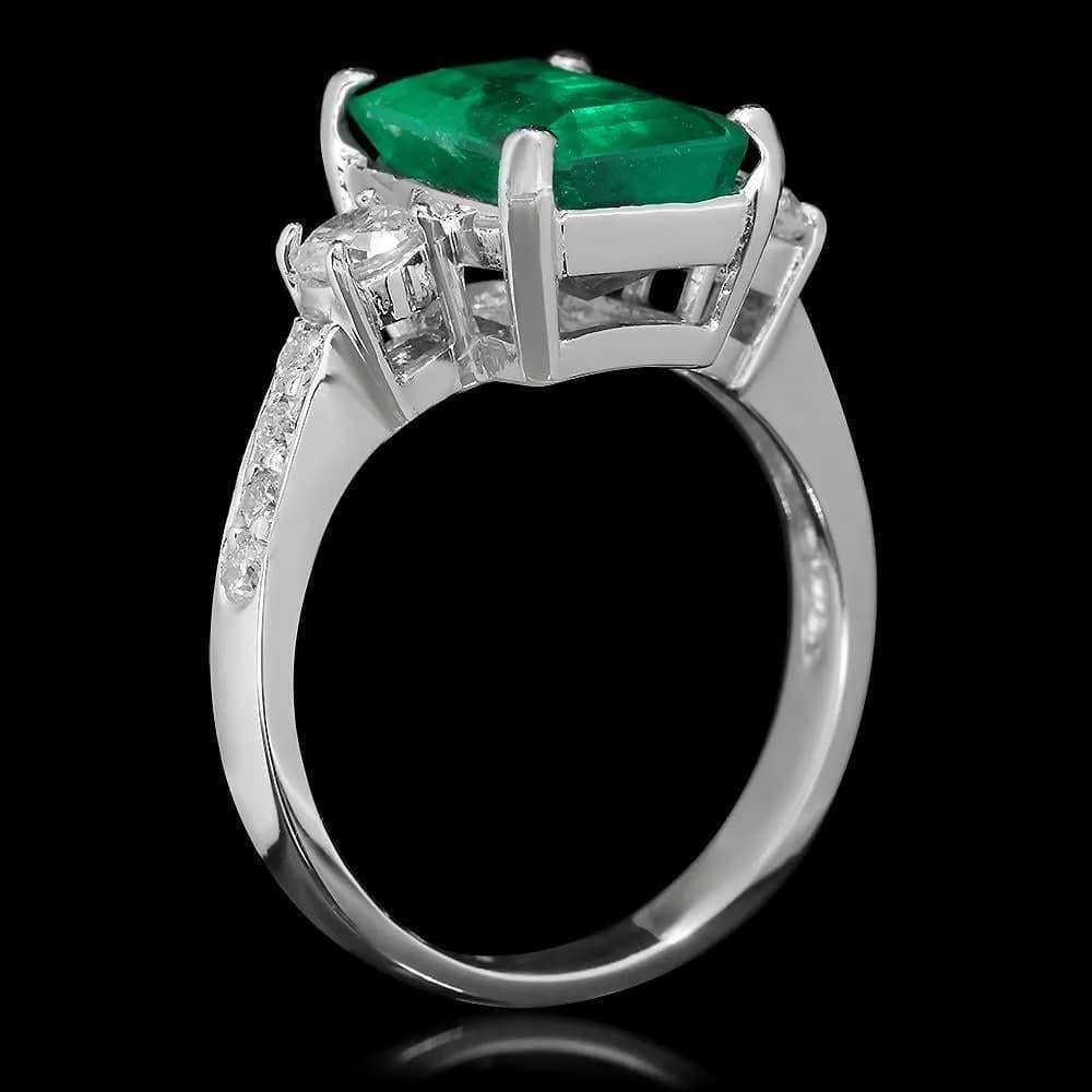 4.10Ct Natural Emerald and Diamond 18K Solid White Gold Ring

Total Natural Green Emerald Weight is: Approx. 3.60 Carats 

Emerald Measures: Approx. 12 x 7 mm

Natural Round Diamonds Weight: Approx. 0.50 Carats (color G-H / Clarity SI1-SI2)

Ring