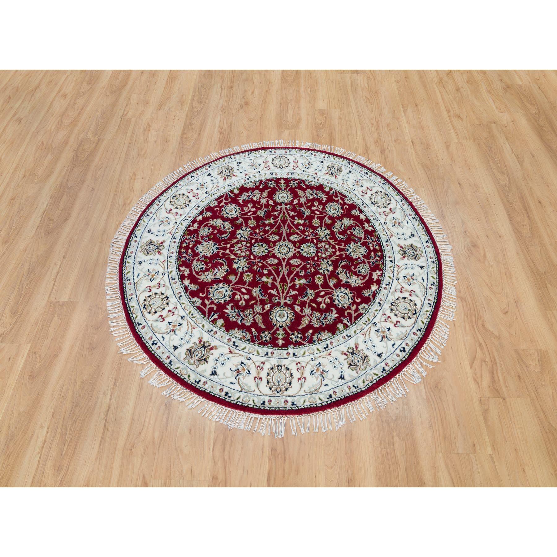 Burgundy Red, Nain with All Over Flower Design, 250 KPSI, Extra Soft Wool, Hand Knotted, Round Oriental Rug
Primary materials: Wool
Latex: No Pile 
height: 0.25 Inches
Style: Traditional
Primary color: Red
Secondary colors: Green, Blue, Brown, Yale