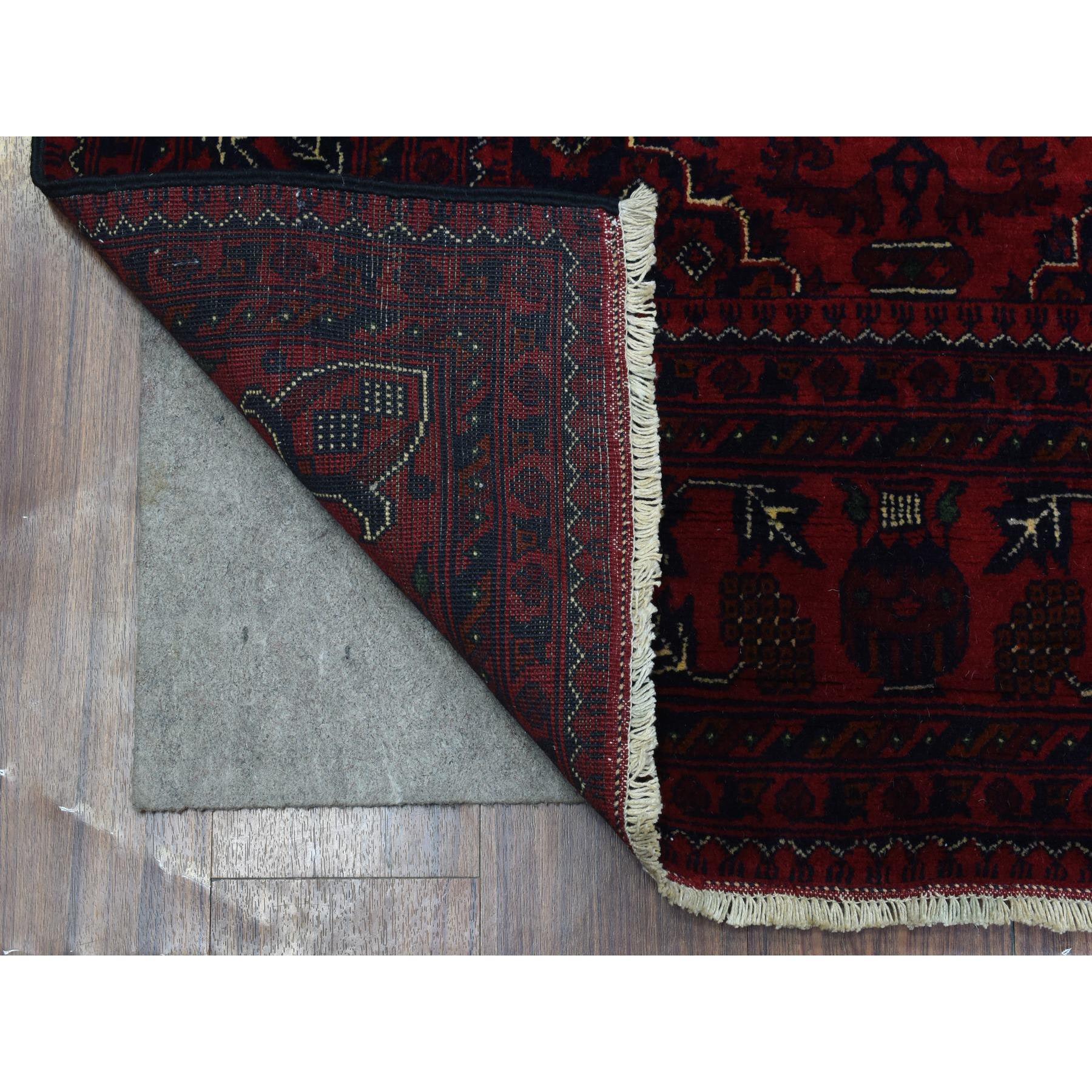 This is a truly genuine one-of-a-kind Red Hand Knotted Tribal Design Soft Wool Afghan Khamyab Oriental Rug. It has been Knotted for months and months in the centuries-old weaving craftsmanship techniques by expert artisans.
Primary materials: