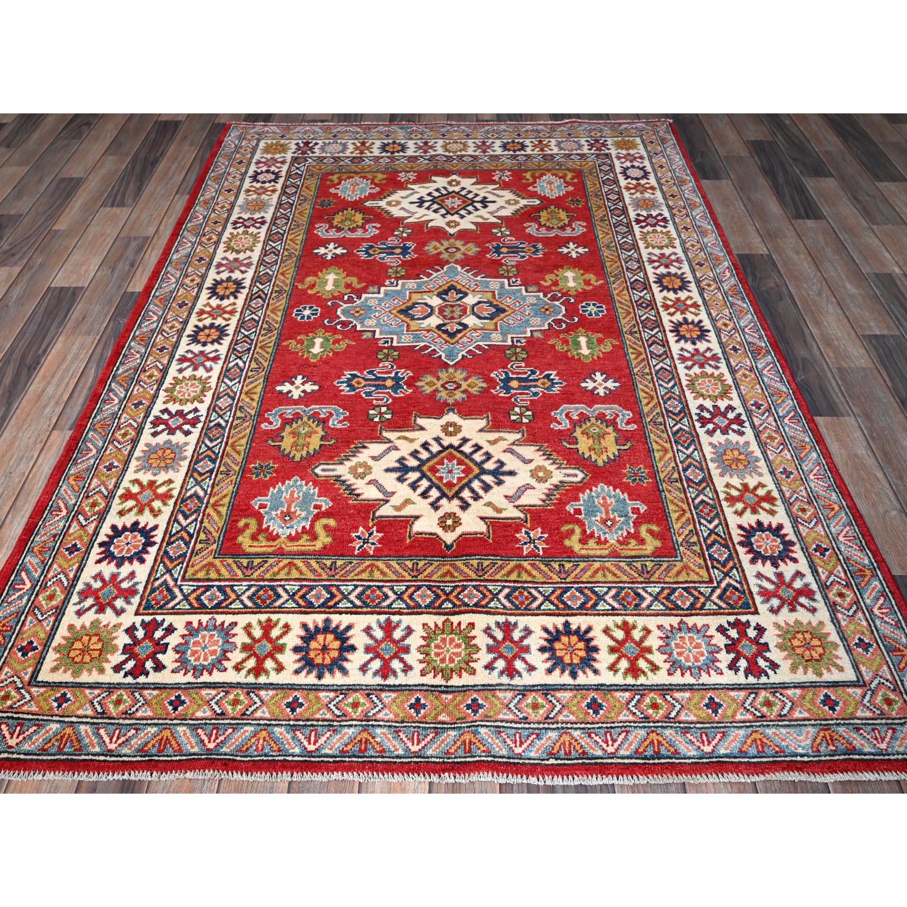 Imperial Red, Kazak with Geometric Medallions Design, Vegetable Dyes, Hand Knotted, Denser Weave, Pure Wool, Oriental Rug
Primary materials: Wool
Latex: No Pile 
height: 0.25 Inches
Style: Traditional
Primary color: Red
Secondary colors: Light Blue,