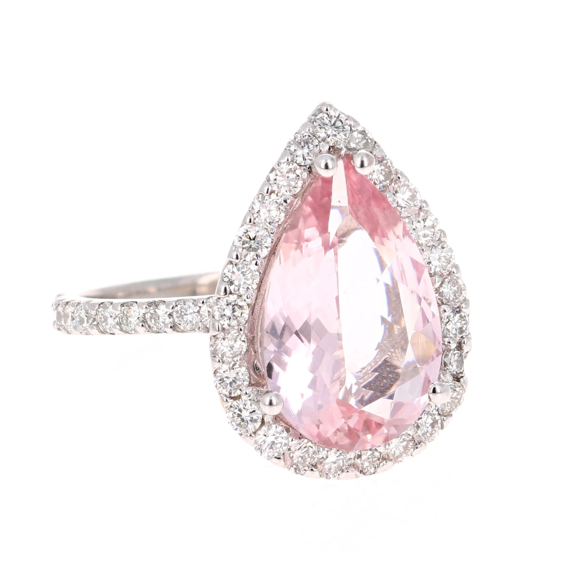 A lovely Engagement Ring Option or as an alternate to a Pink Diamond Ring! 

This gorgeous and classy Morganite Diamond Ring has a 3.19 Carat Pear Cut Pink Morganite and has 47 Round Cut Diamonds that weigh 0.92 carats (Clarity: VS2, Color: H). The