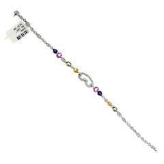 4,11 carati di zaffiri multicolori e 0,95 carati di diamanti in oro bianco 18 carati