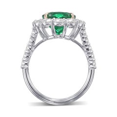 4.11 cts Certified Oval Muzo Emerald and Diamond Halo Ring