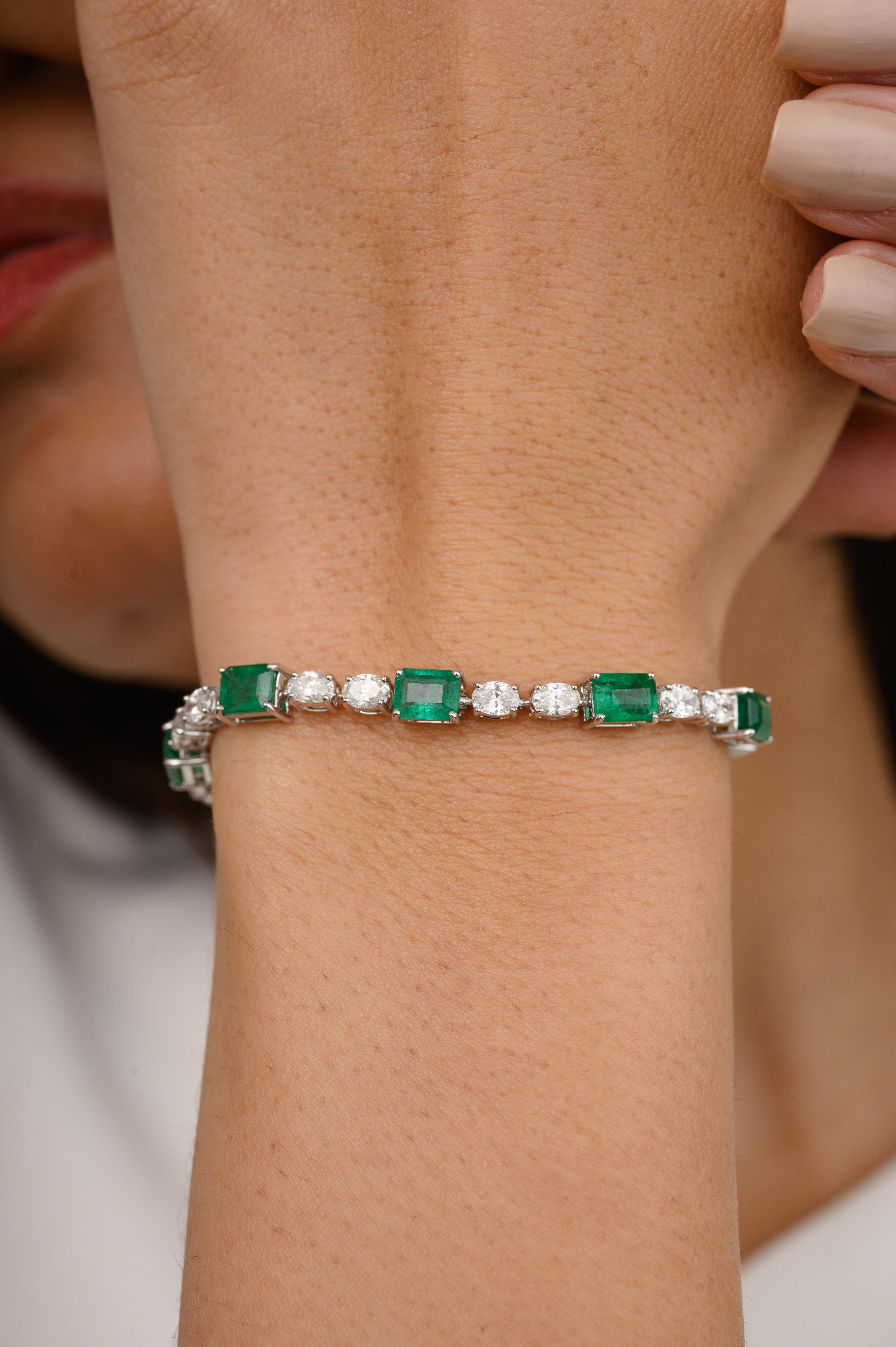 This 4.11 CTW Emerald and 2.24 CTW Diamond Tennis Bracelet in 18K gold showcases endlessly sparkling natural emerald, weighing 4.11 carat and diamonds weighing 2.24 carats. It measures 6.5 inches long in length. 
Emerald enhances intellectual