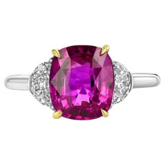Used 4.11 carat cushion-cut, untreated Mozambique Ruby ring. AGL certified. 