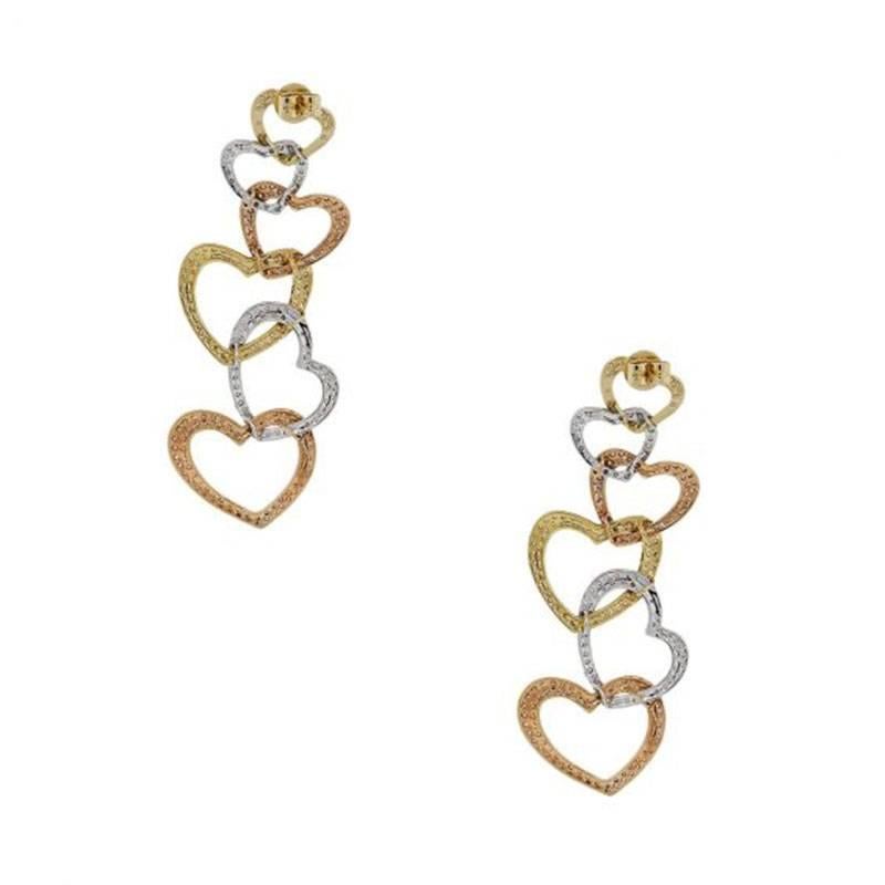 Style: Dangle earrings
Material: 18k white gold, 18k yellow gold and 18k rose gold
Diamond Details: Approximately 4.12ctw round brilliant diamonds. Diamonds are G/H in color and VS in clarity.
Earring Measurements: 2.60″ x 0.17″ x 0.80″
Fastening: