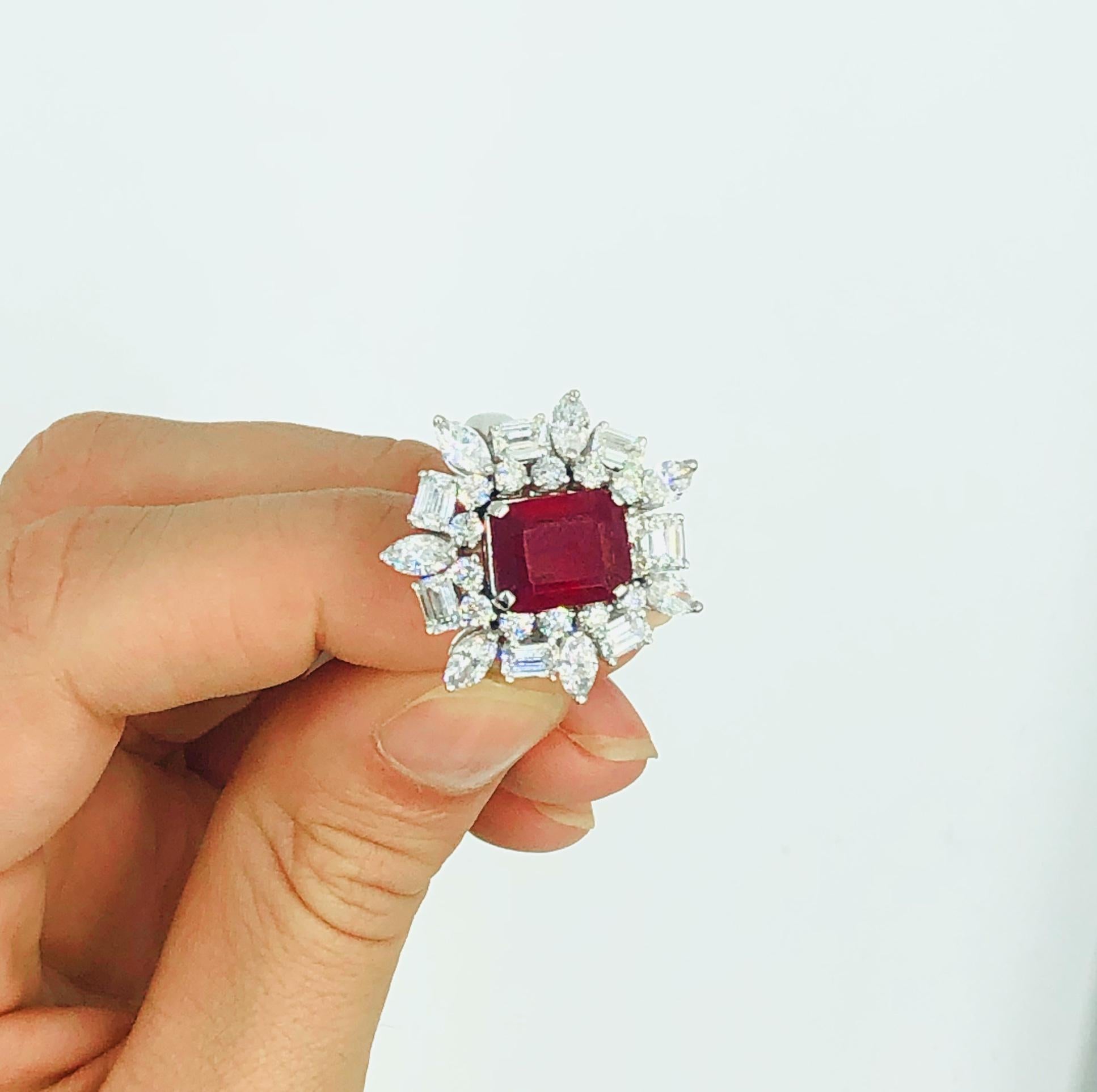 Emerald-Cut Ruby = 4.12 Carat
( Natural Ruby, Color Enhanced )
Diamonds = 3.44 Carats
( Color: F; Clarity: VS )
18K White Gold