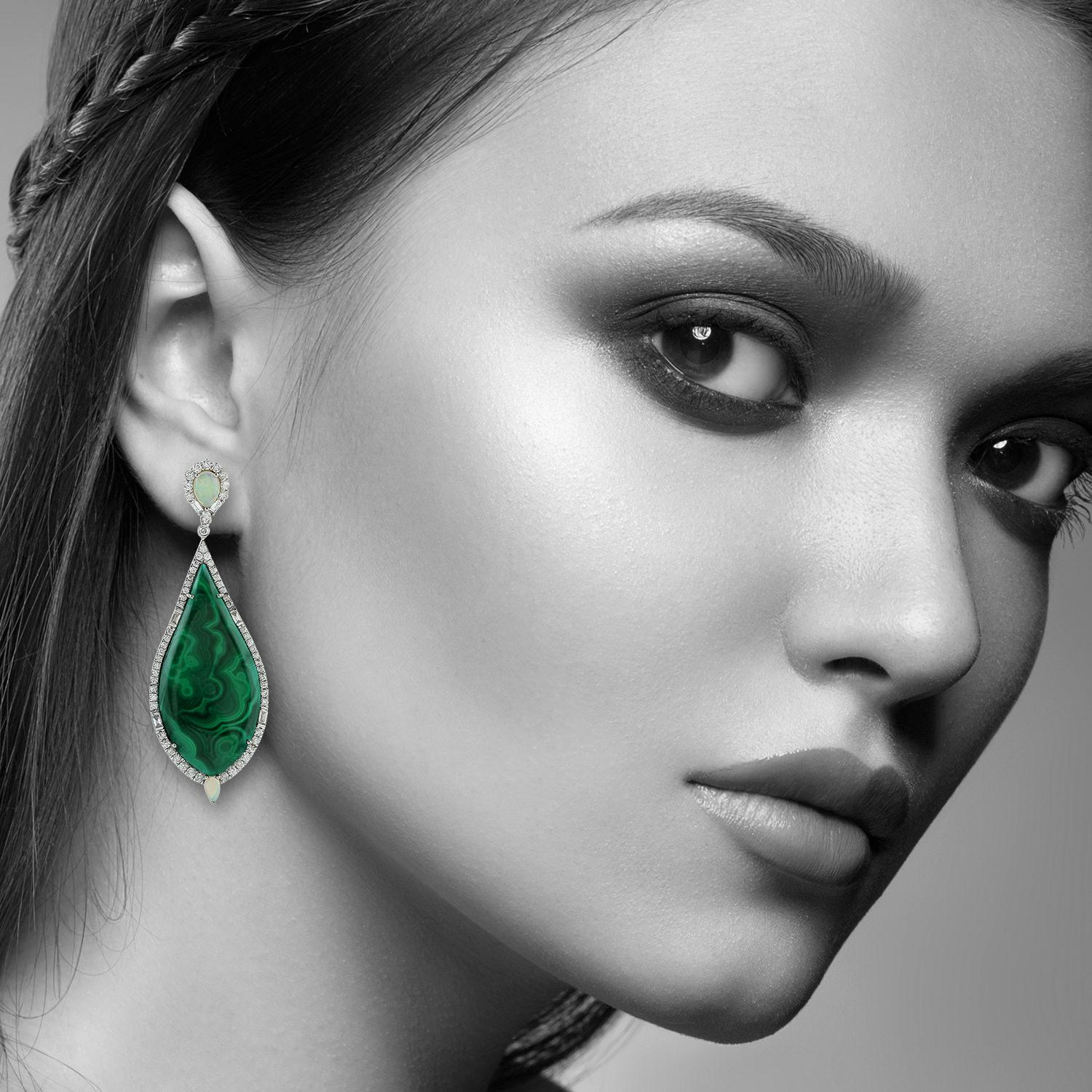 Handcrafted from 18-karat gold, these stunning earrings are set with 41.2 carats malachite, 1.0 carat opal and 2.27 carats of sparkling diamonds.

FOLLOW  MEGHNA JEWELS storefront to view the latest collection & exclusive pieces.  Meghna Jewels is