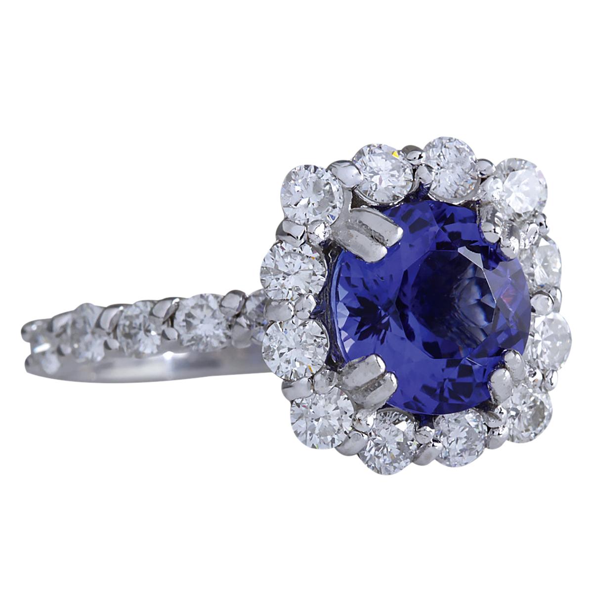 Stamped: 14K White Gold
Total Ring Weight: 4.5 Grams
Total Natural Tanzanite Weight is 2.70 Carat (Measures: 8.50x8.50 mm)
Color: Blue
Total Natural Diamond Weight is 1.42 Carat
Color: F-G, Clarity: VS2-SI1
Face Measures: 13.20x13.20 mm
Sku: