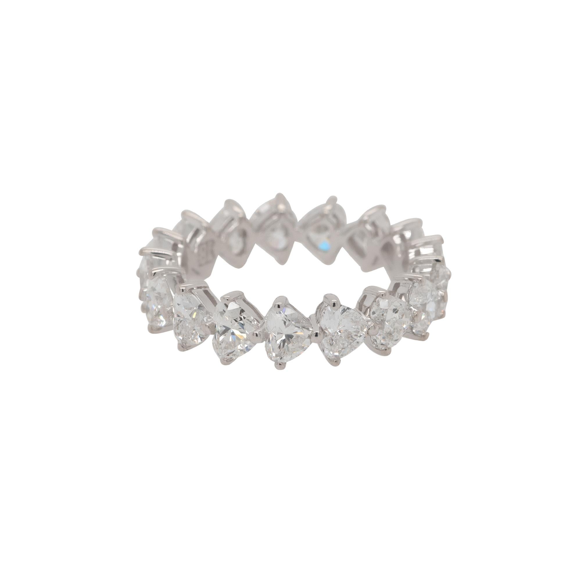 Material: 18k White Gold
Diamond Details: Approx. 4.12ctw of natural trillion cut Diamonds. Diamonds are G/H in color and VS in clarity
Ring Measurements: 22mm x 5mm x 22mm
Ring Size: 6.5 
Total Weight: 3.4g (2.2dwt)
Additional Details: This item