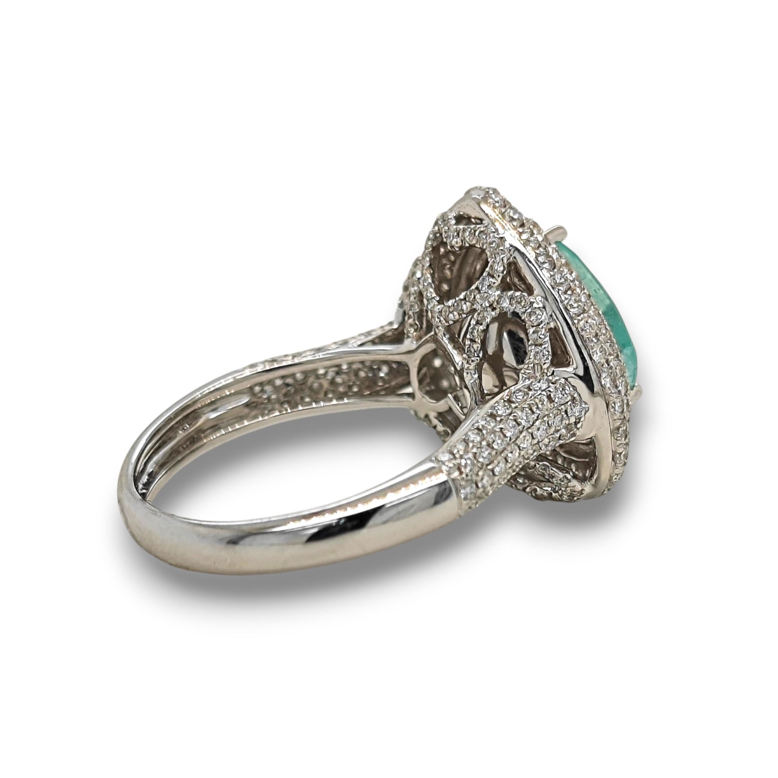 1 Neon Blue Heart Paraiba Tourmaline Gemstone: 2.93 Carats
289 White Round Diamonds: 1.19 Carats
Metal: 18K White Gold, 6.70 Grams
