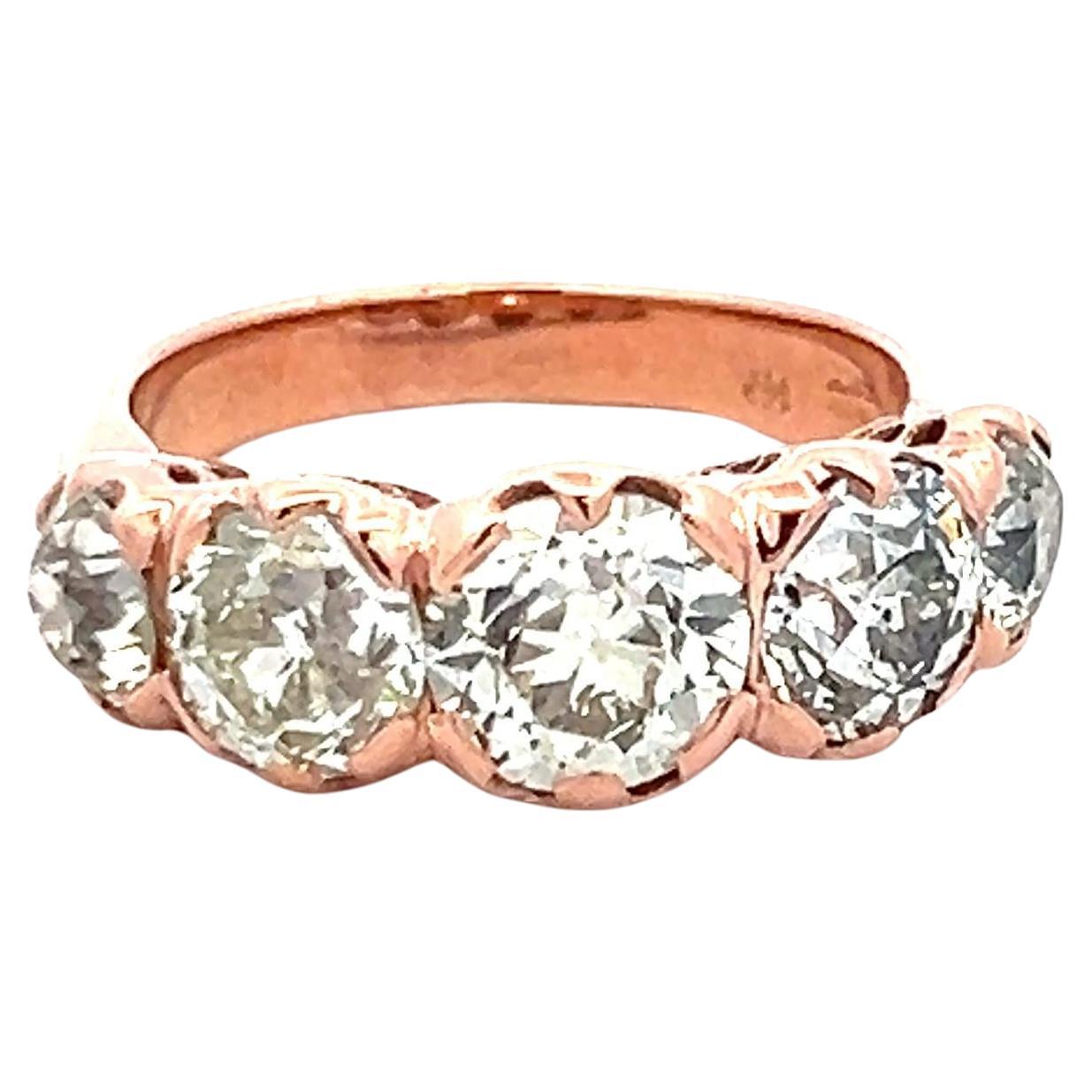 4.12 Carat Old European Cut Diamond 14 Karat Rose Gold Five-Stone Ring