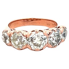4.12 Carat Old European Cut Diamond 14 Karat Rose Gold Five-Stone Ring