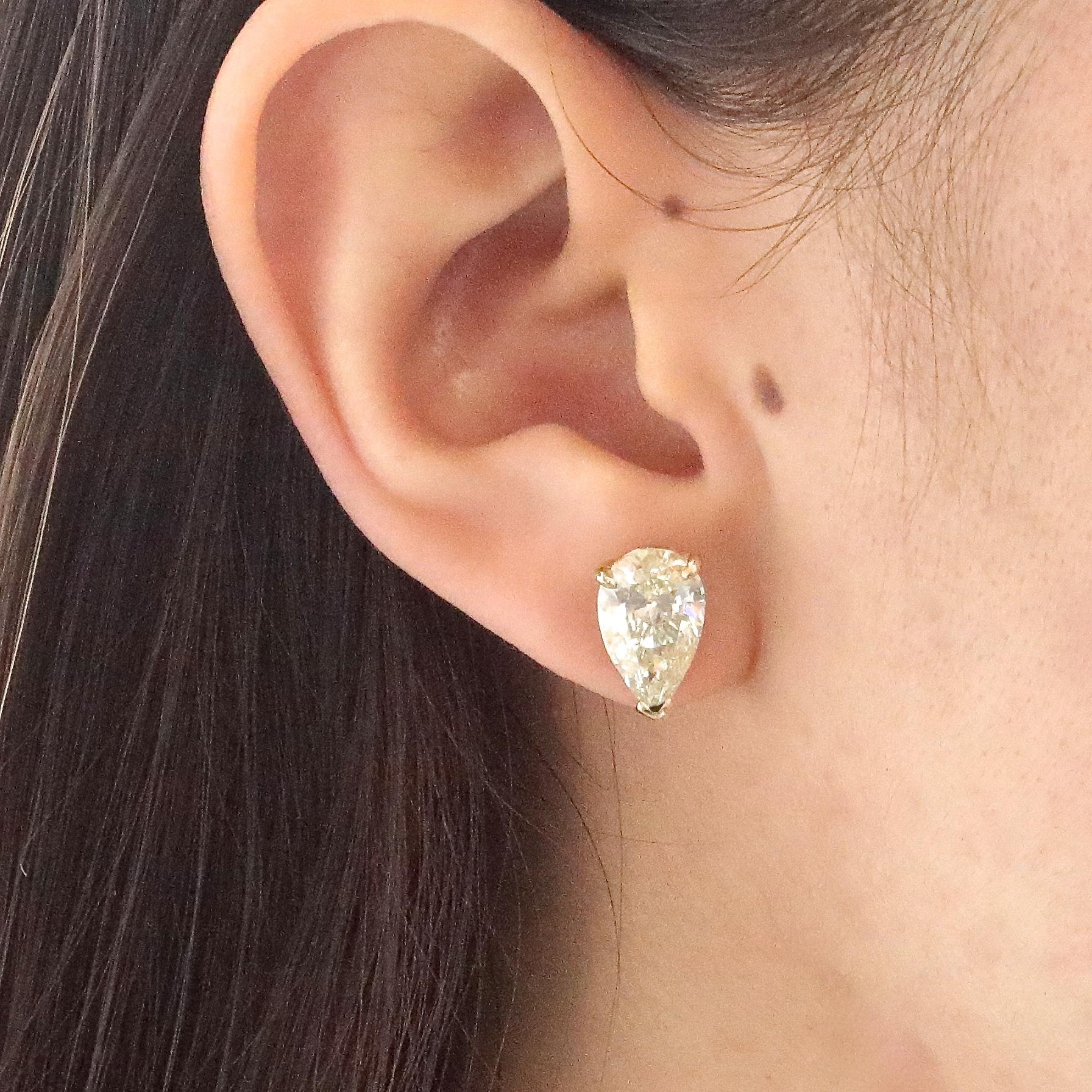 Pear Cut 4.12 Carat Pear Shaped Diamonds 14 Karat Gold Stud Earrings