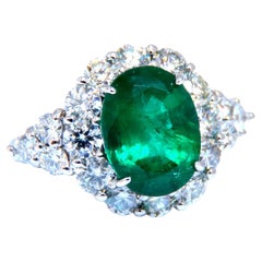Bague Halo Prime en diamants et émeraude verte naturelle de 4,12 carats de 14 carats