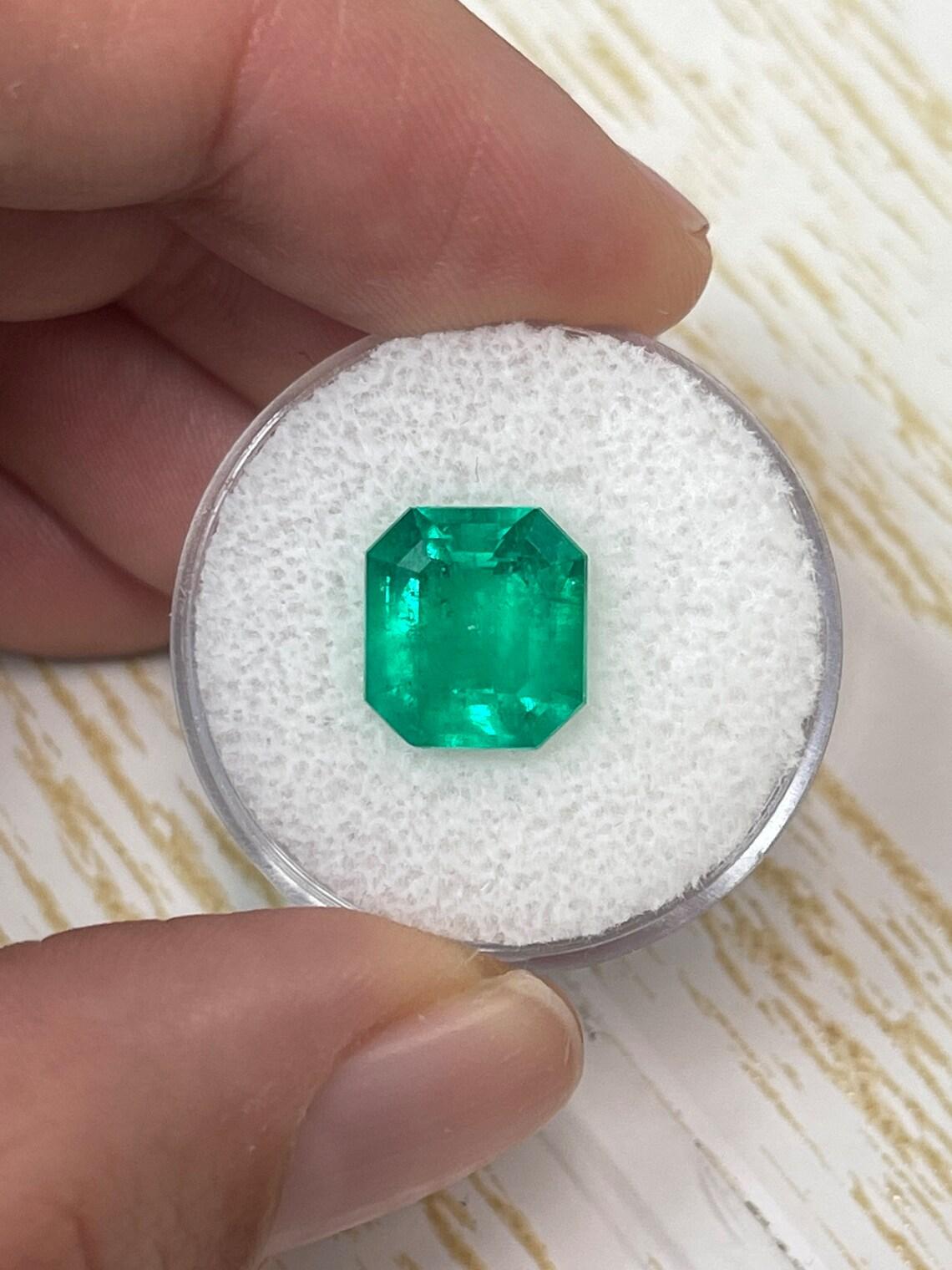 Stone: Emerald
Weight: 4.12-carats
Shape: Asscher Cut
Clarity: Transparent
Luster: Very Good
Color: Vivid Yellowish Green
Measurements: 10.57mm x 9.72mm x 6.09mm
Geographic Origin: Colombia
Treatment: Natural, Oiling

Comments: Due to their growth