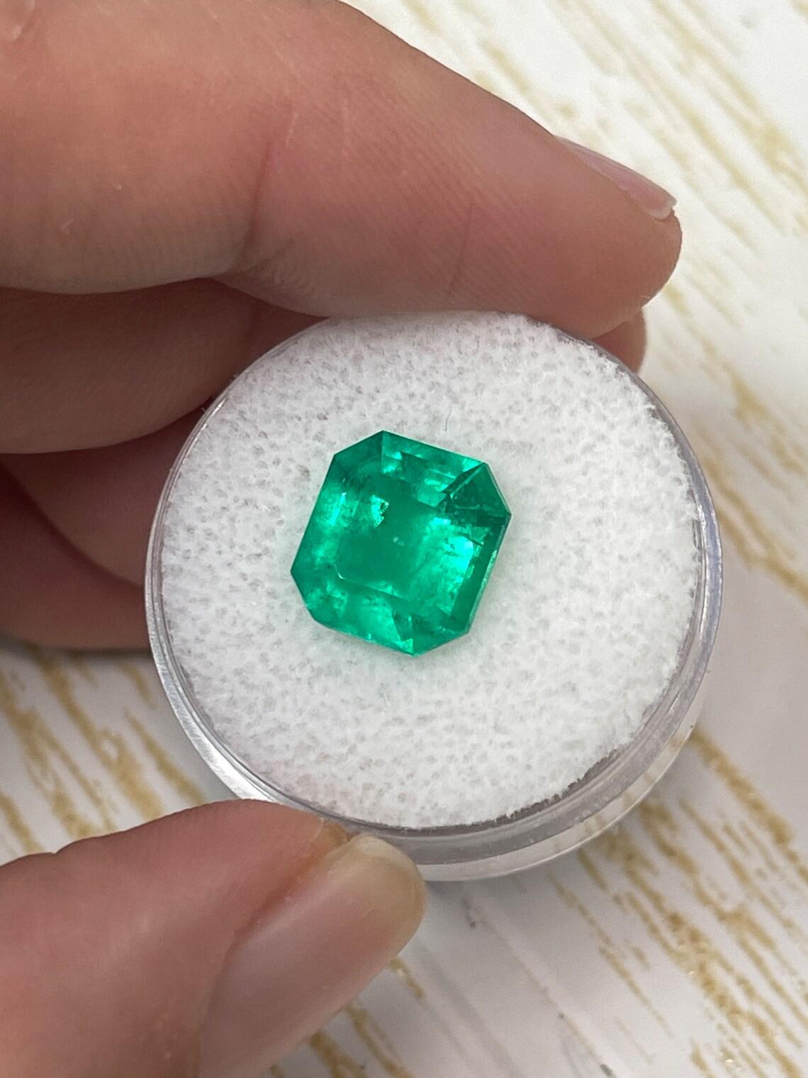 Modern 4.12ct Vivid Yellowish Muzo Green Colombian Emerald 10.5x9.7mm Emerald Cut For Sale