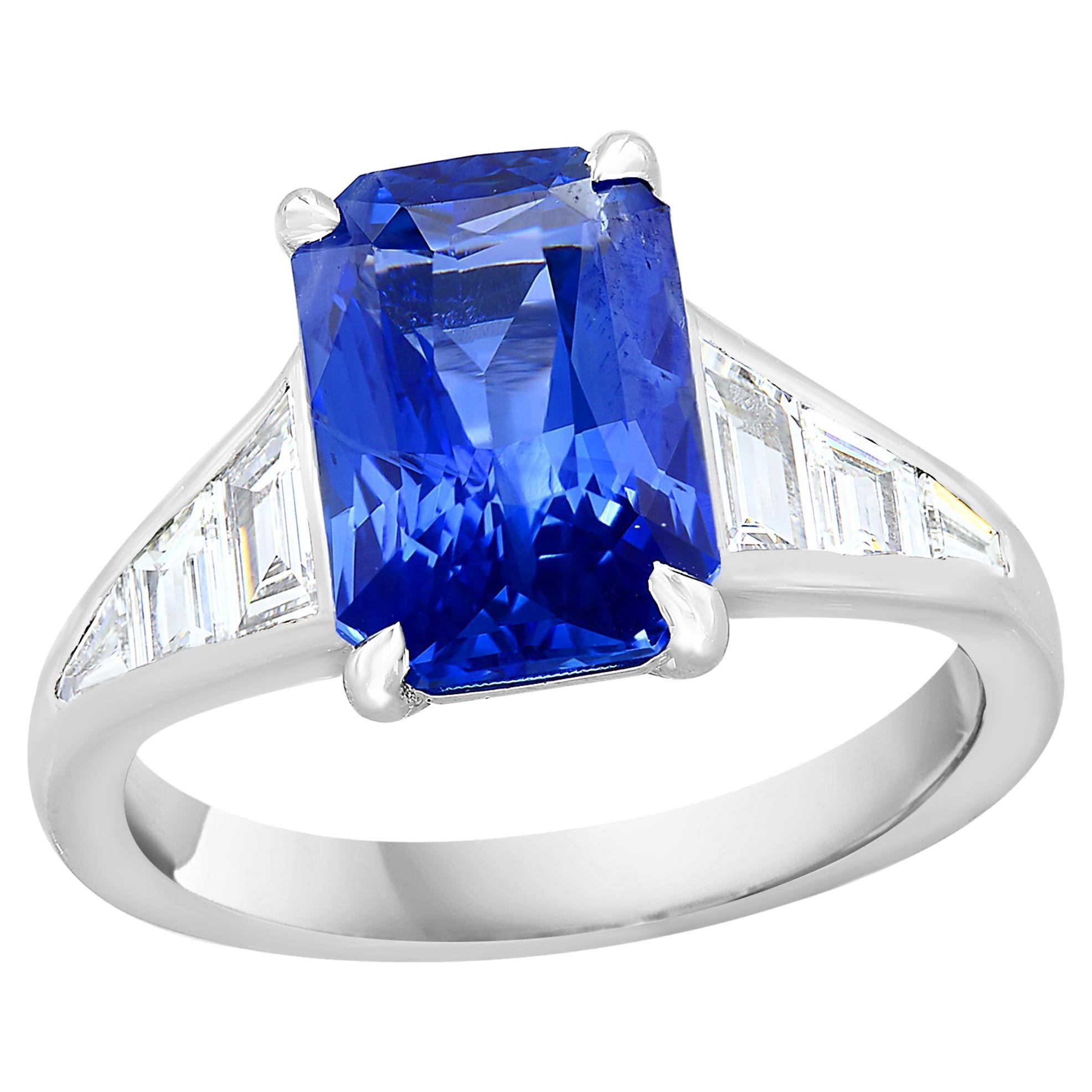 4.13 Carat Emerald Cut Blue Sapphire and Diamond Engagement Ring in Platinum
