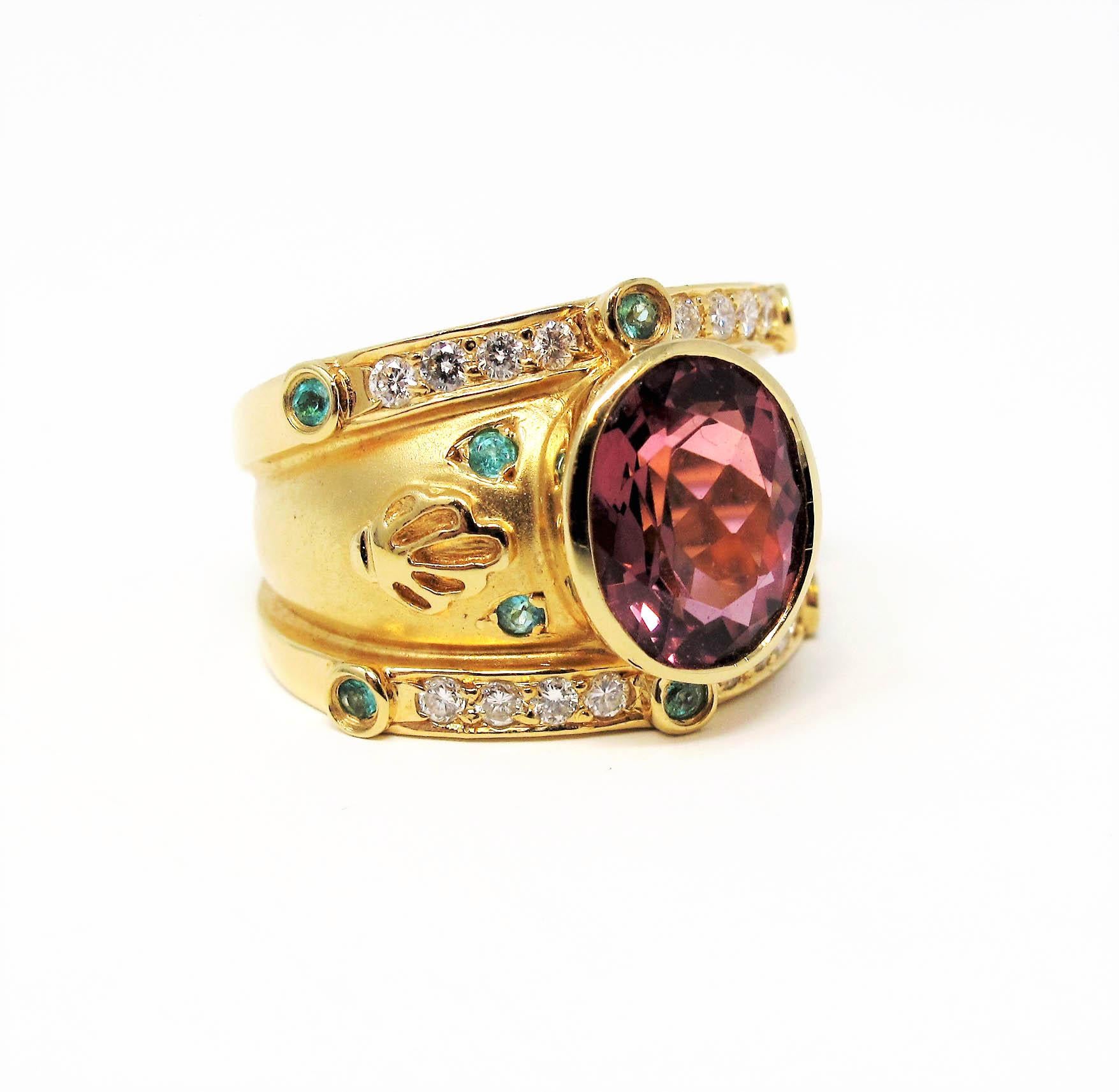 Gorgeous Etruscan style band ring featuring vibrant tourmaline gemstones and diamonds.  This stunning ornate cigar band ring by jewelry designer Judy Mayfield is bursting with bold color and design. The incredible pink, green and white stones paired