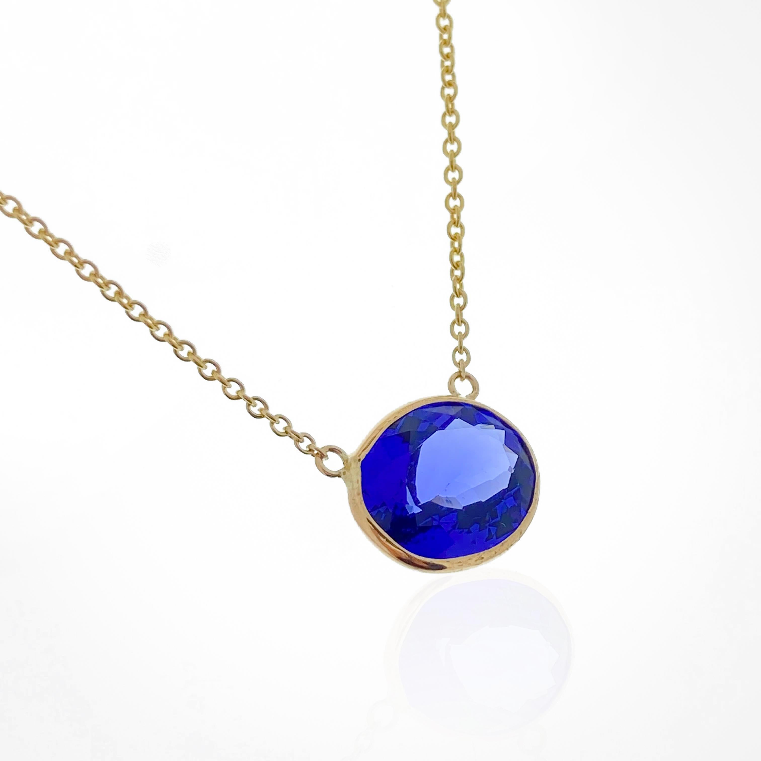Contemporary 4.13 Carat Oval Blue Tanzanite Fashion Necklaces In 14k Yellow Gold  For Sale