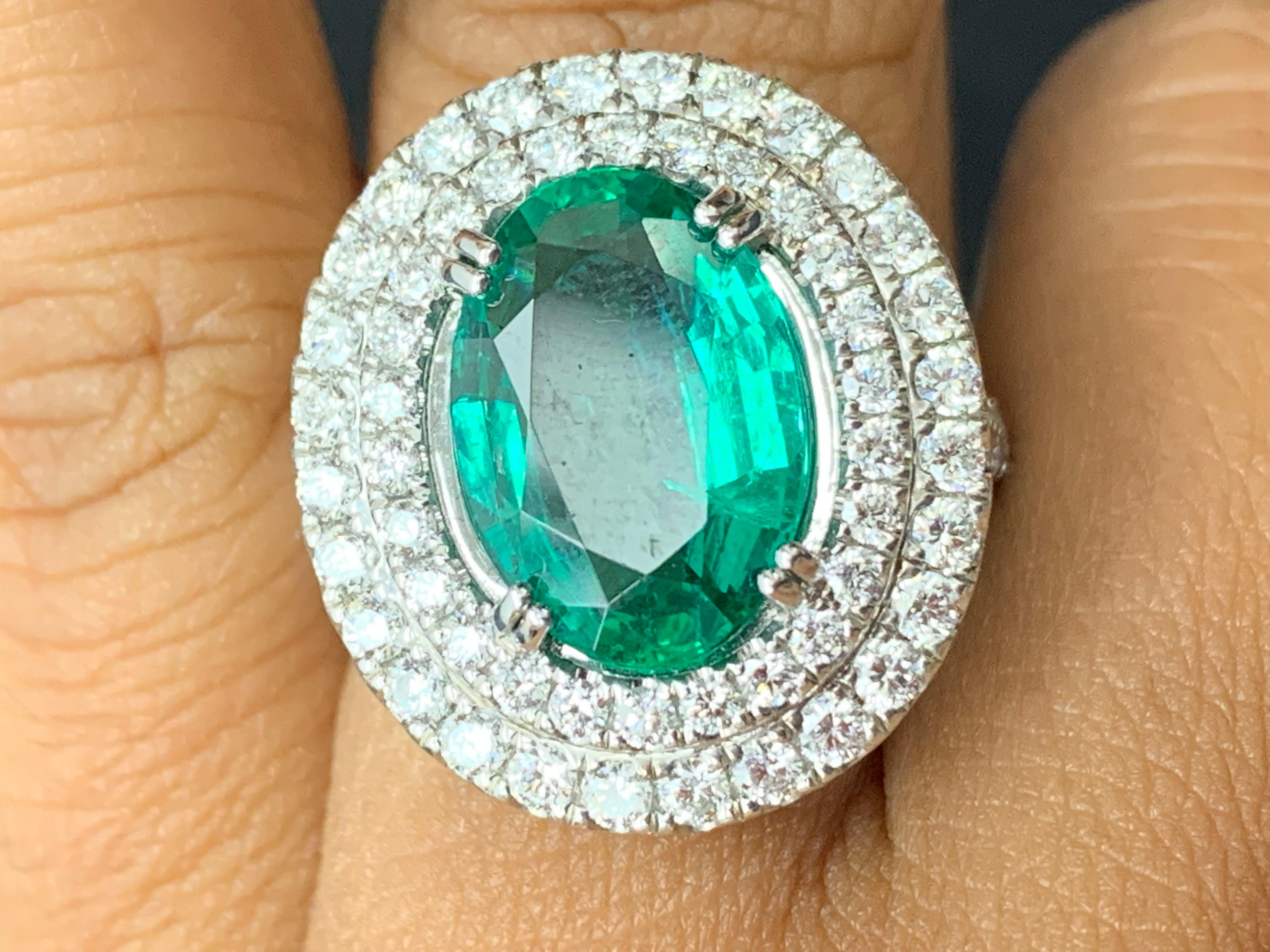 4.13 Carat Oval Cut Emerald and Diamond Engagement Ring in 18K White Gold For Sale 12