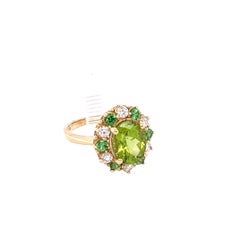 4,13 Karat Peridot Tsavorit Diamant 14 Karat Gelbgold Ring