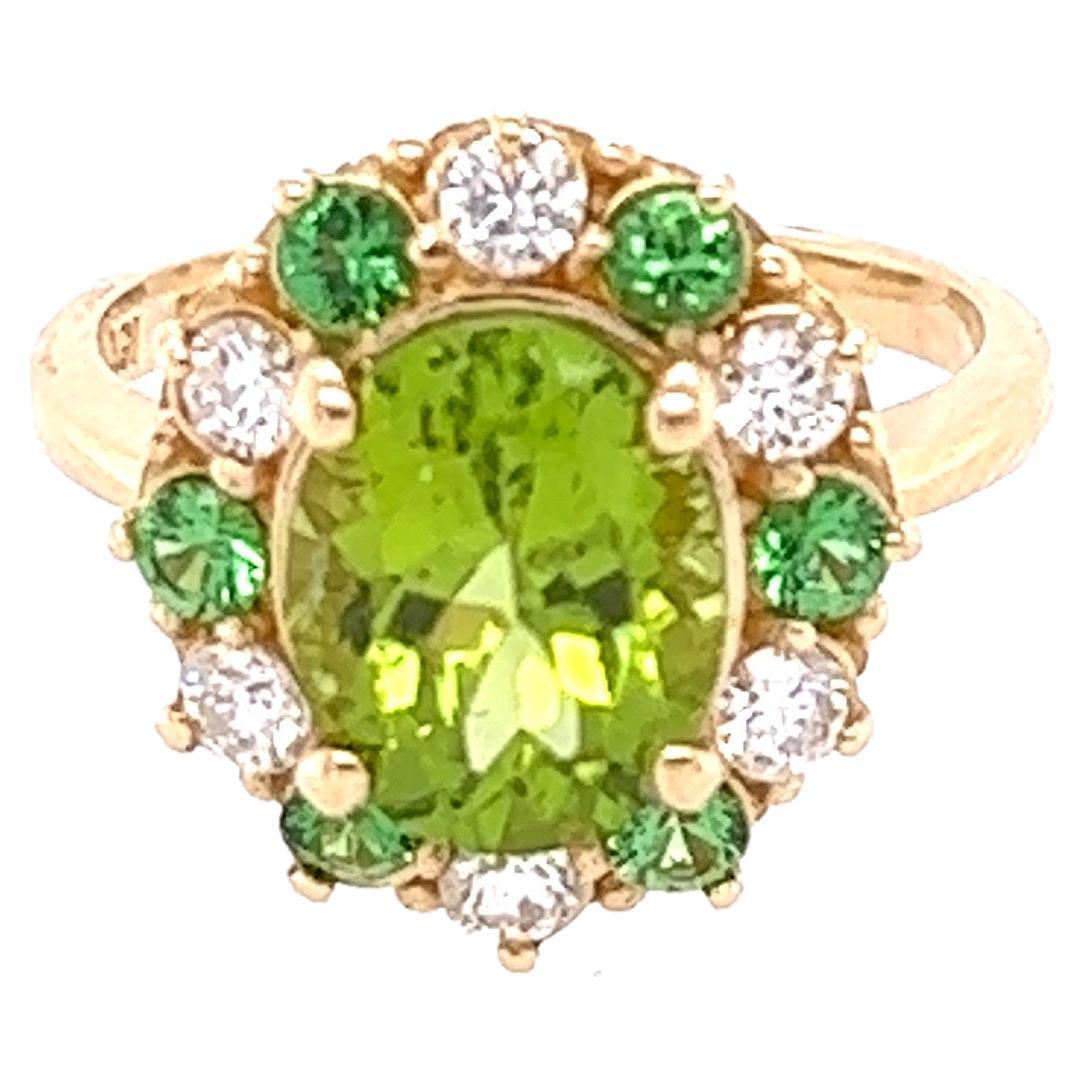 4,13 Karat Peridot Tsavorit Diamant 14 Karat Gelbgold Ring