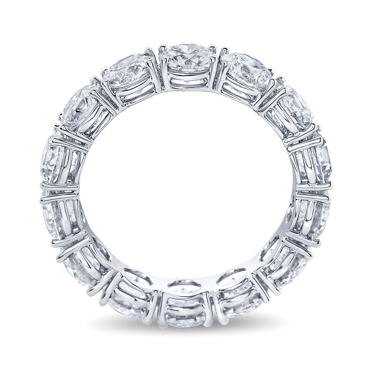 Exquisite eternity band hand crafted in 18k gold with each one of the 14 diamonds weighing over .30 carats. The Diamonds are G-H color, SI clarity with a 4.13 total carat weight.
These beautiful Diamonds are mounted in a shared prong setting, thus