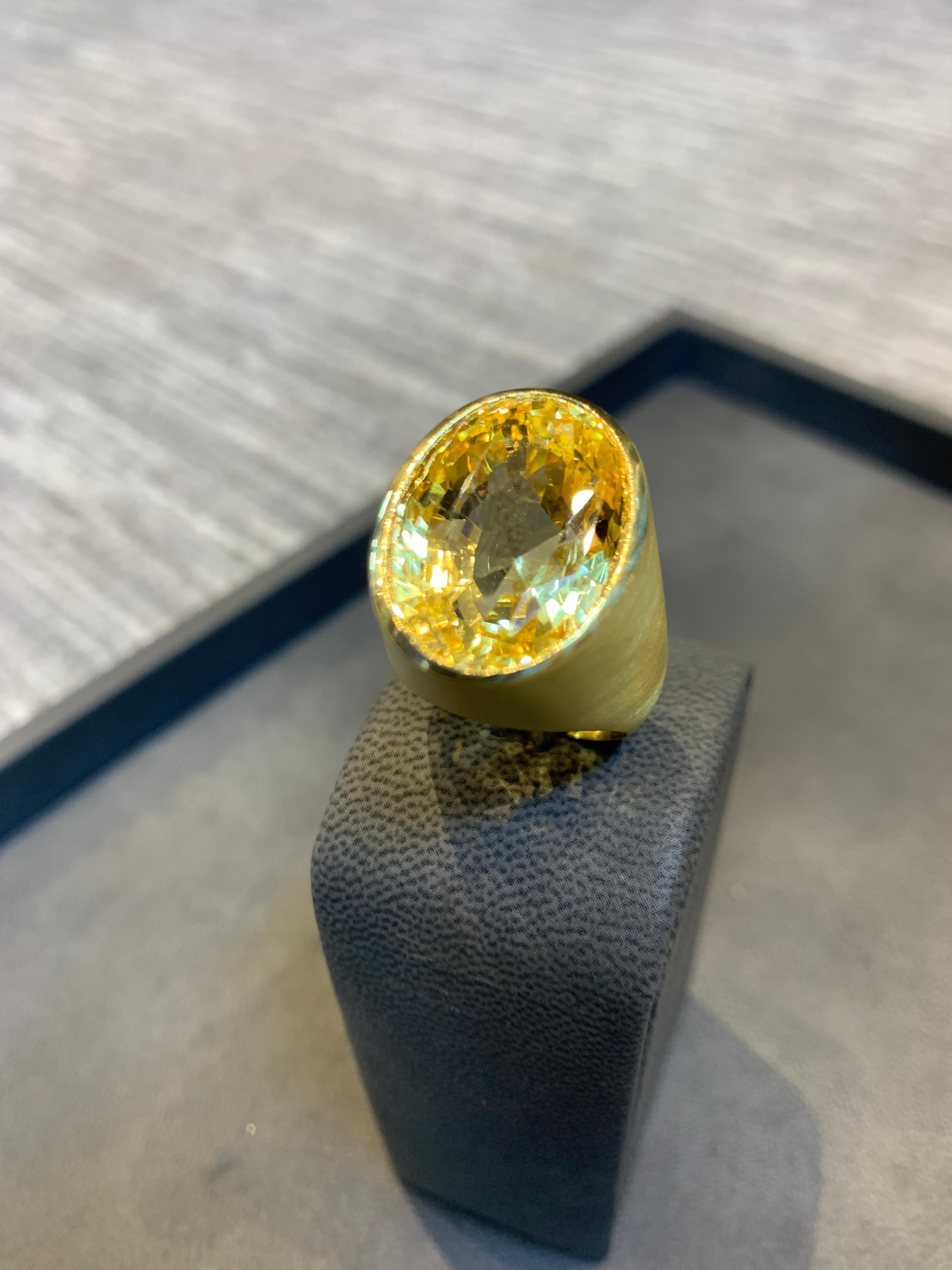 41.33 Carat Natural Yellow Sapphire Gold Men's Ring
Center Stone Weight: 41.33 Cts 
18K Matte Yellow Gold 
AGL Certified  as Natural No Heat 
Ring Size: 9.75
Re-sizable to any size free of charge 