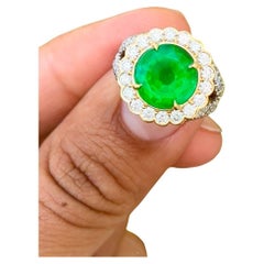 4.13ct Zambian minor-oil, Emerald Ring in Platinum and 18K YG. GIA certified.