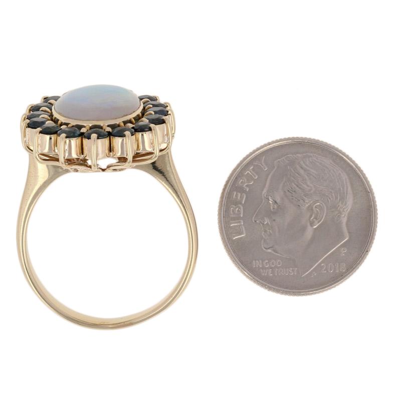 4.13 Carat Oval Cabochon Cut Opal and Sapphire Ring, 18 Karat Yellow Gold Halo 2
