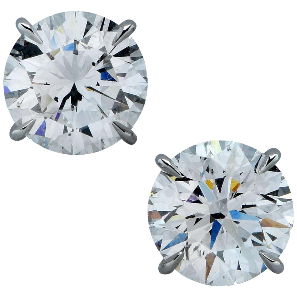 This gorgeous 4 carat pair of round brilliant cut natural diamonds offer fantastic size, bright white color, and a lively play of light! Measuring 8.1mm in diameter, the diamonds have a great spread and a larger than typical look for their weight!