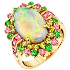 4.14 Carat Crystal Opal, Peridot, Pink Spinel, and Tsavorite Cocktail Ring