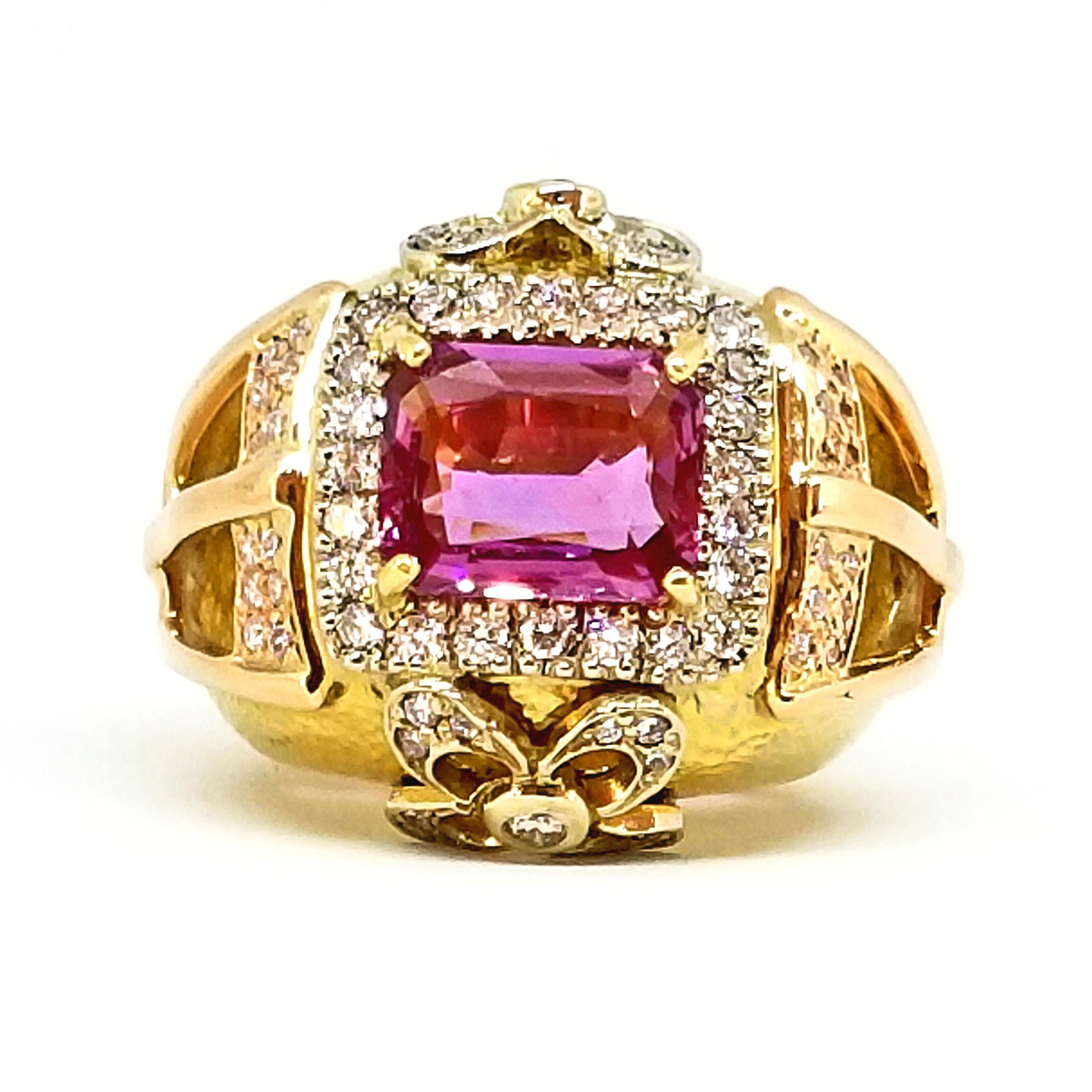 This Large, One of a Kind Statement Ring features an Emerald Cut, Purple Pink Sapphire of 4.14 Carats. The Ring itself is set with 1.13 carats total weight of Round Brilliant White and Natural Champagne Diamonds. The ring itself is a Dome Style with