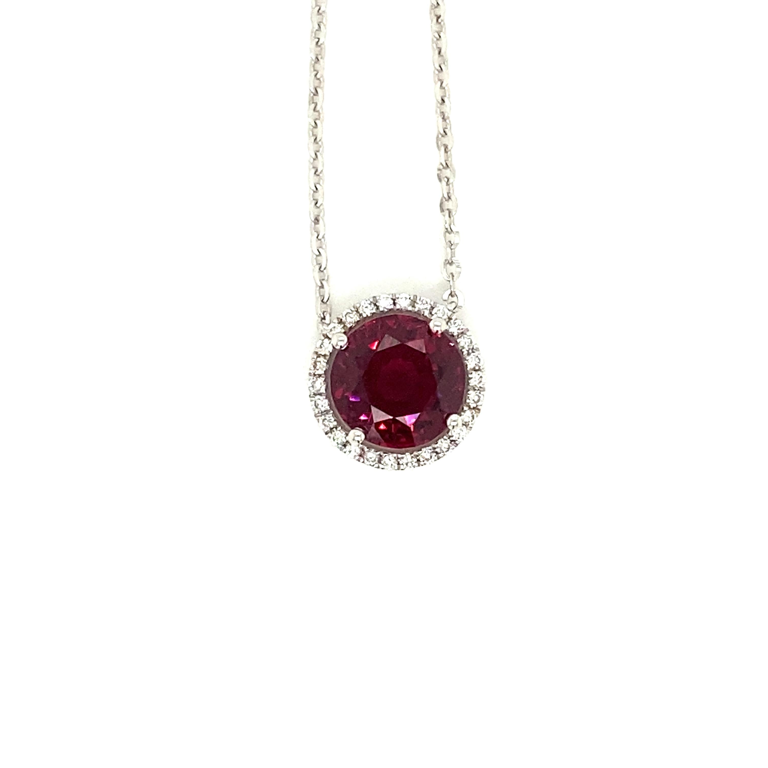 4.14 Carat Round-Cut Vivid Pink-Purple Garnet and White Diamond Pendant Necklace:

A beautiful pendant necklace, it features a 4.14 carat round-cut vivid pink-purple garnet in the centre surrounded by a halo of white round-brilliant cut diamonds