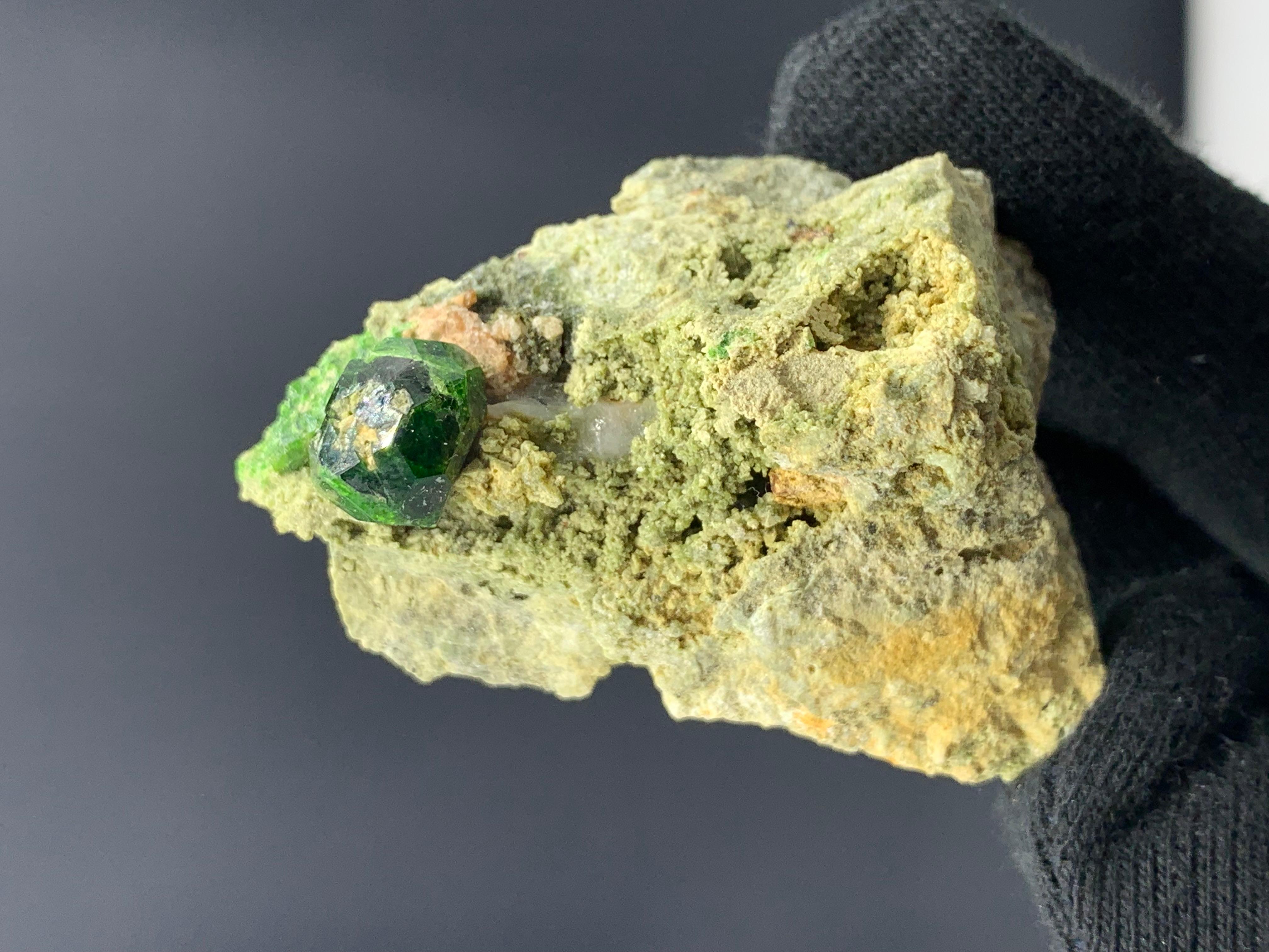 41.40 Gram Pretty Demantoid Garnet Specimen From Balochistan, Pakistan 

Weight: 41.40 Gram
Dimension: 5.3 x 3.8 x 2.4 Cm
Origin: Balochistan, Pakistan

Demantoid is the green gemstone variety of the mineral andradite, a member of the garnet group