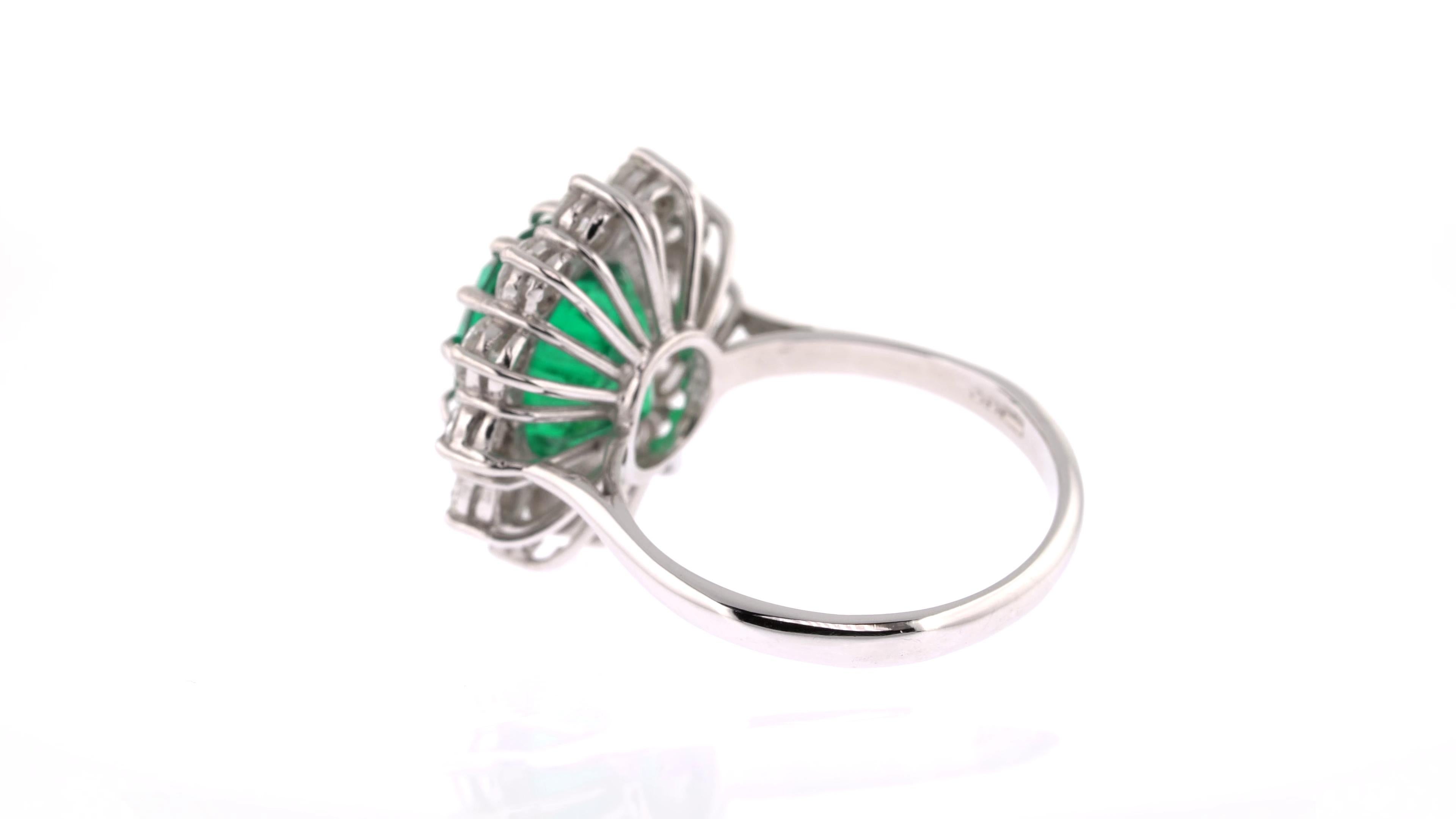 Victorian 4.15 Carat Emerald Ring with White Diamond Halo