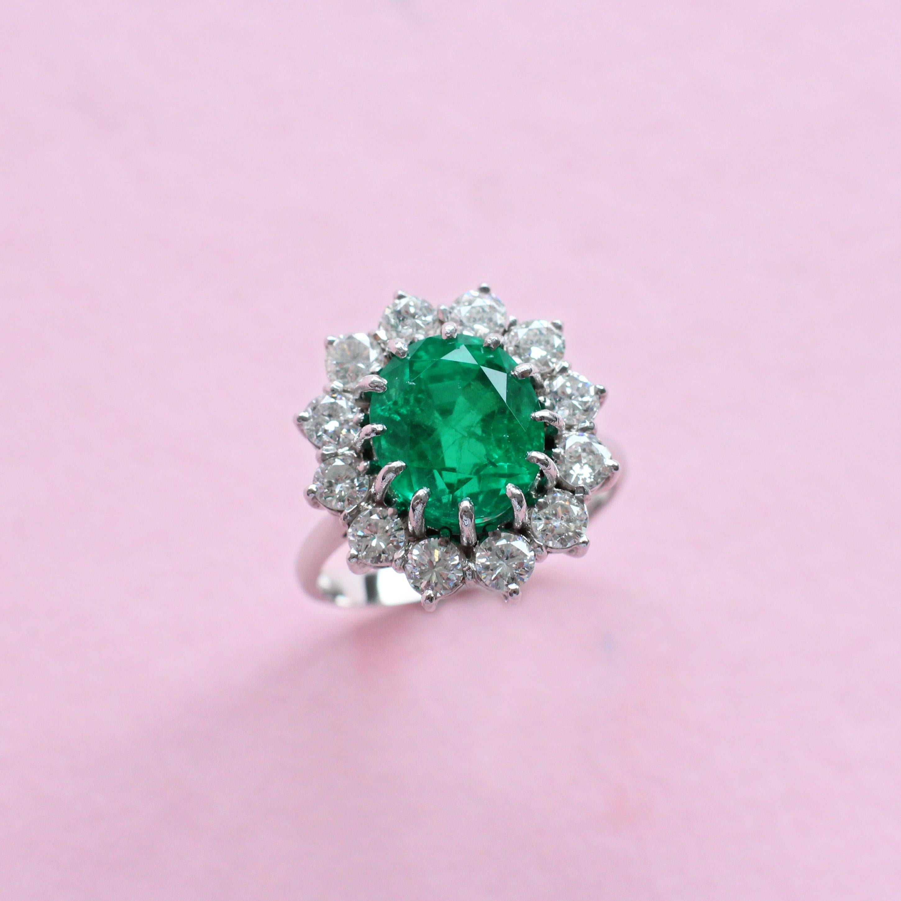 4.15 Carat Emerald Ring with White Diamond Halo In Excellent Condition In London, GB