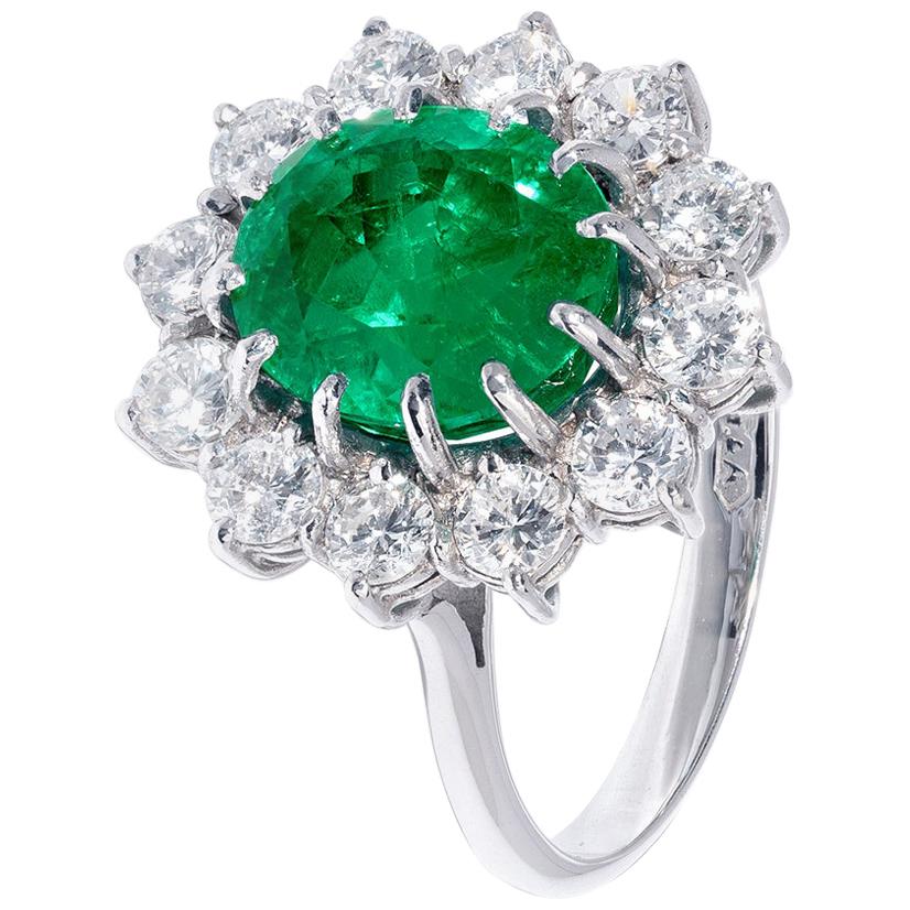 4.15 Carat Emerald Ring with White Diamond Halo