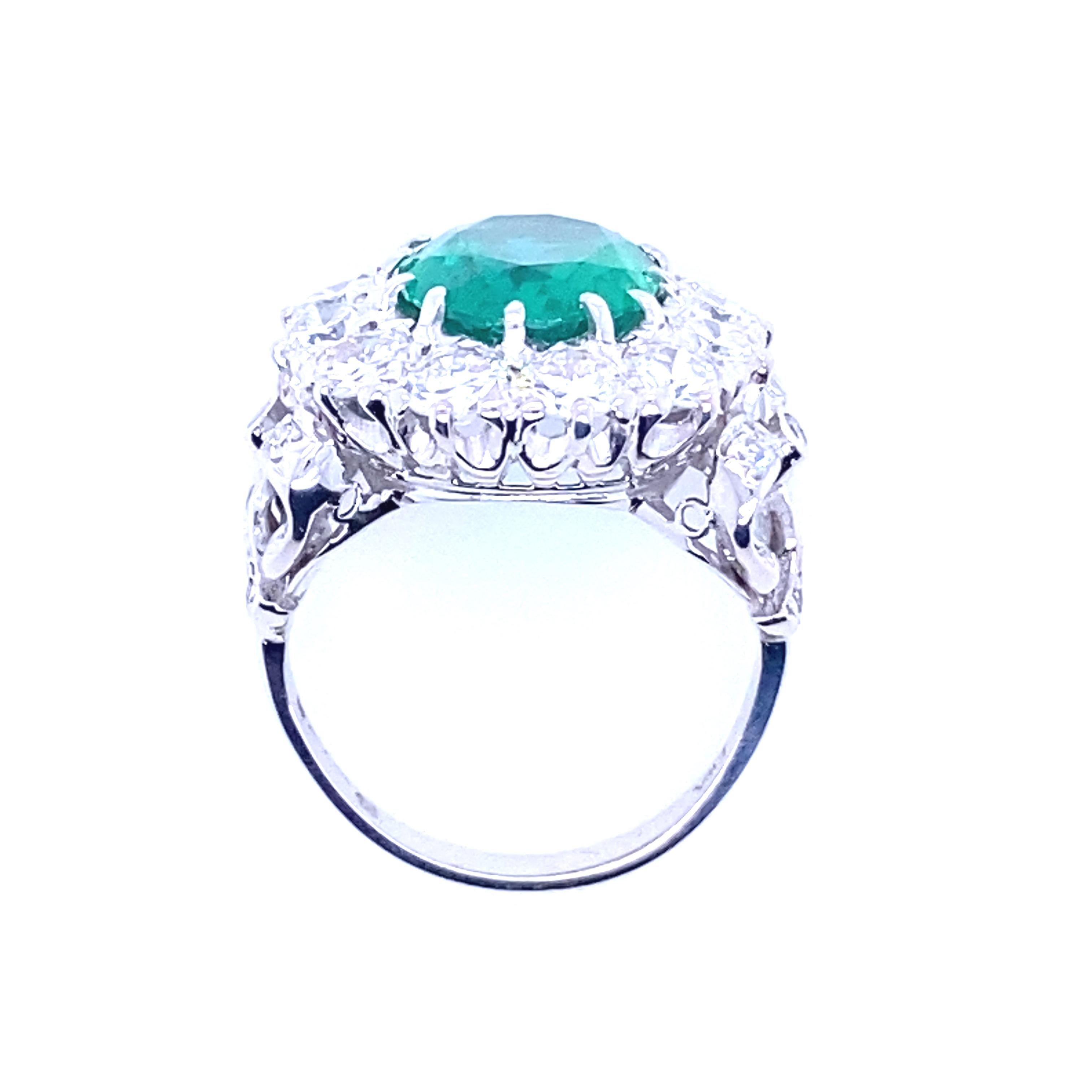 4.15 Carat Zambian Emerald and Diamond Cluster 18 Kt White Gold Engagement Ring For Sale 1