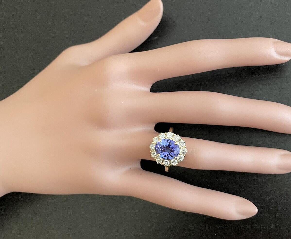 Women's 4.15 Ct Natural Nice Looking Tanzanite and Diamond 14K Solid Yellow Gold Ring For Sale