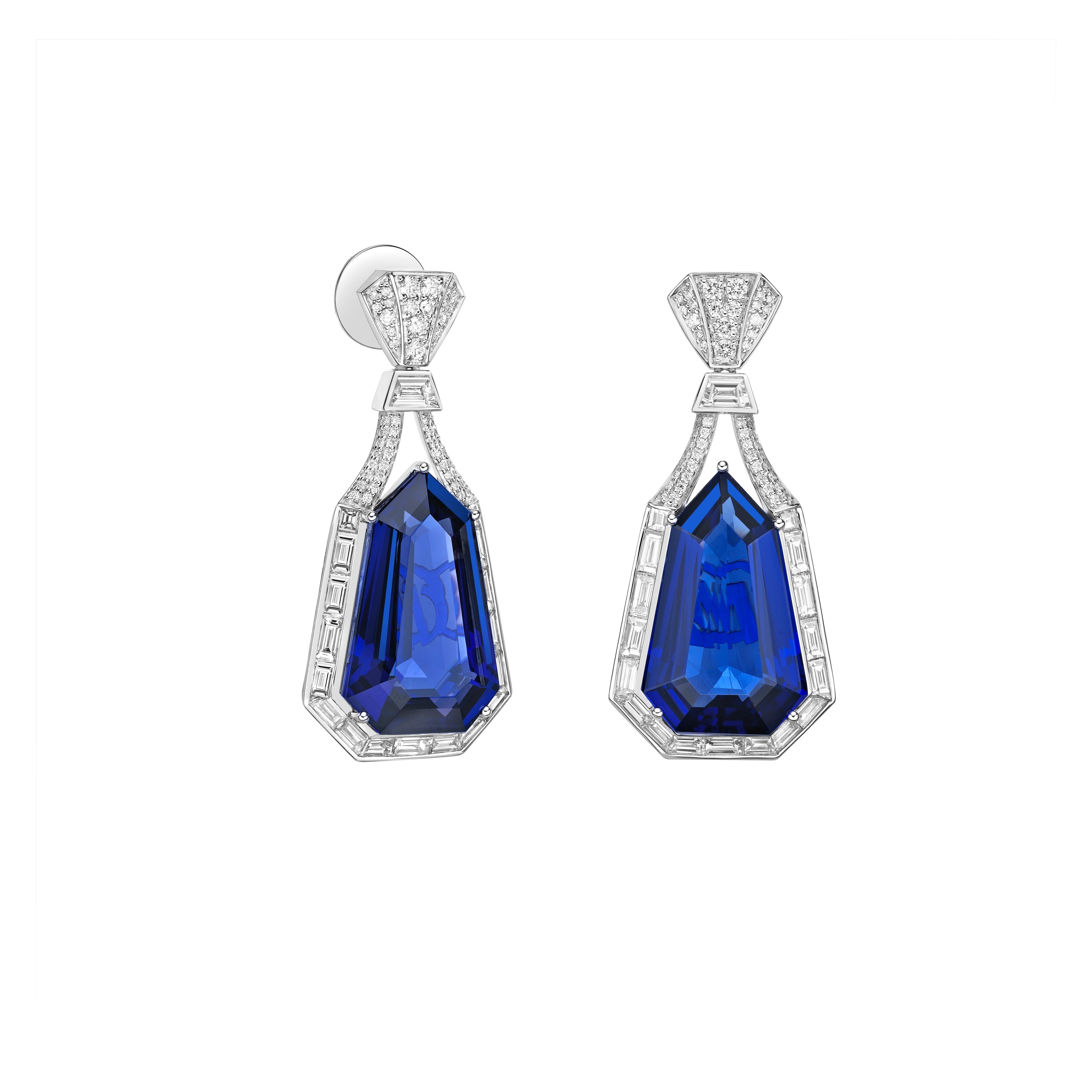 This Tanzanite Jewellery line has high quality beautifully cut Tanzanites. These velvety blue stones are set against an art deco-inspired frame of diamond baguettes.
  
Tanzanite Drop Earrings in 18Karat White Gold with Diamond.

Tanzanite: 41.53