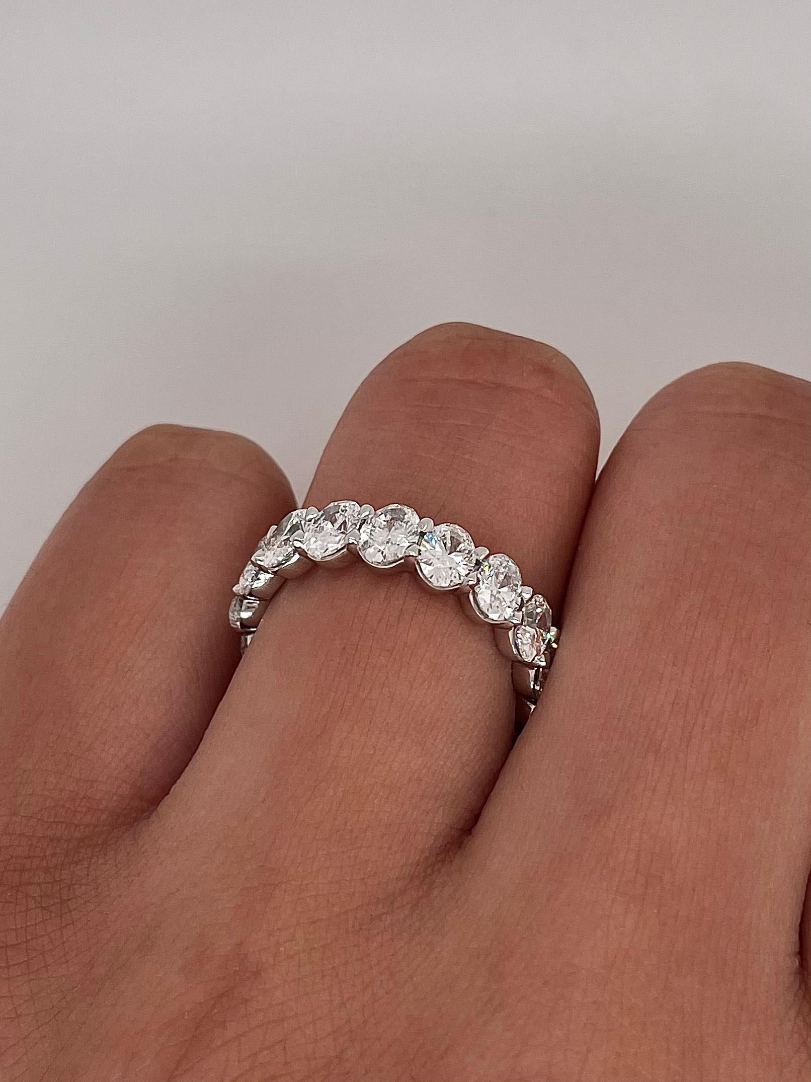 Oval Cut 4.15 Total Carat Shared Prong Diamond Eternity Band in Platinum  For Sale