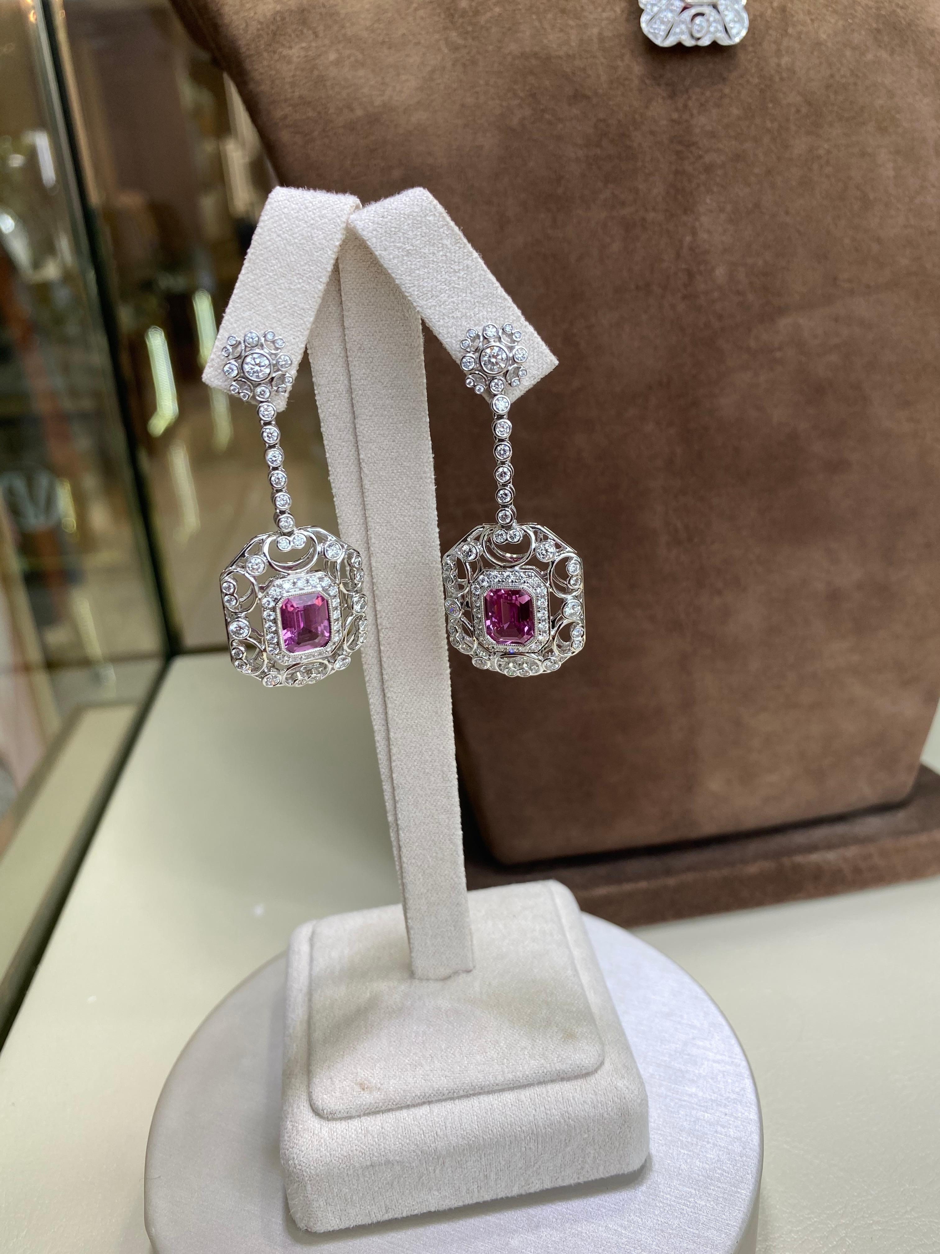 Beautiful 4.15cttw Square-Shaped Rubys surrounded by 1.92cttw Diamond on 18kt White Gold Hooks. With a classic and timeless vintage-inspired design, these earrings will make you feel like you're a royal in the Renaissance Age. Only one pair