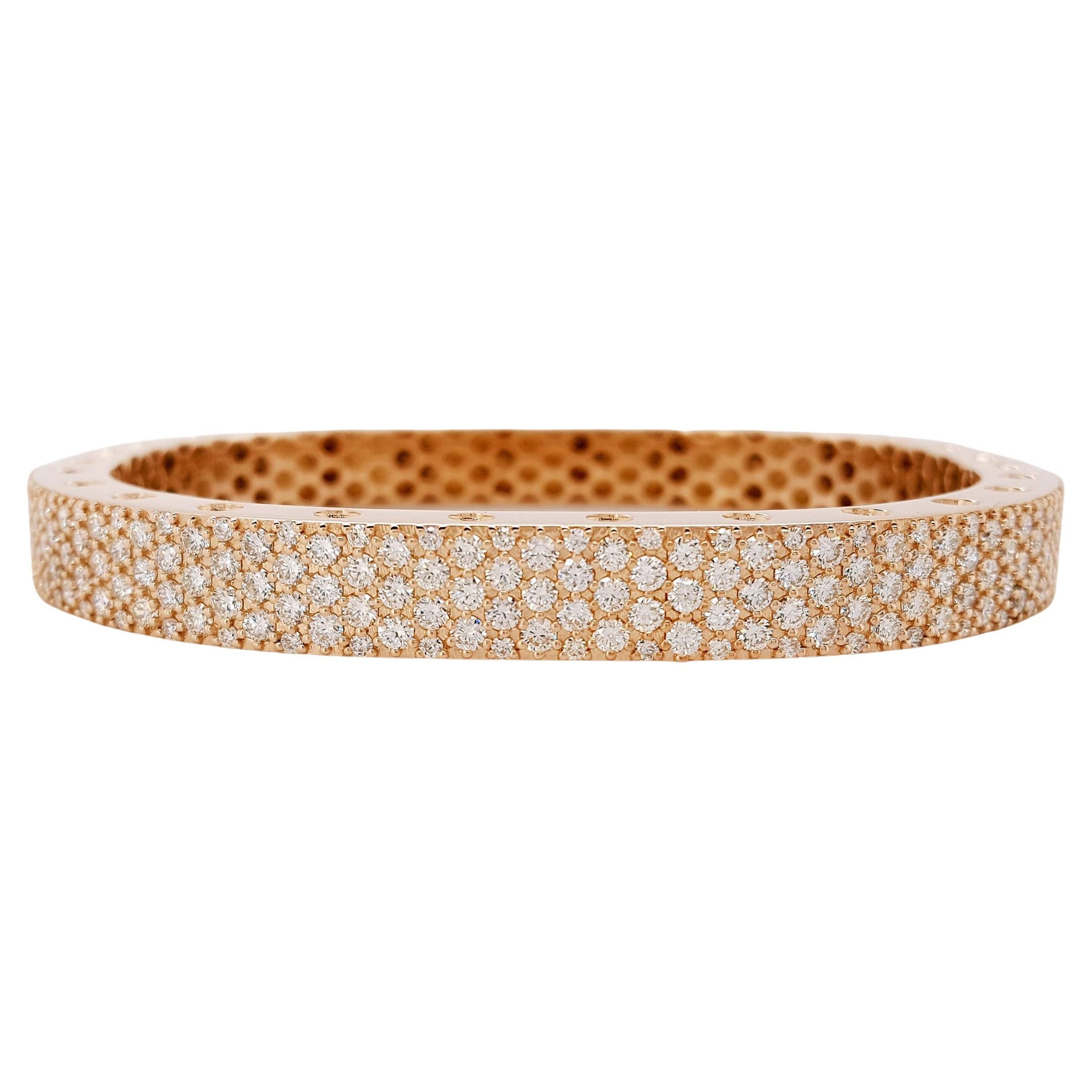 This stunning two section 18 karat rose gold bangle style bracelet is accented with 171 carefully matched white round brilliant diamonds weighing approximately 4.16 carat total. Inspired by art and fashion, Novel Collection is presenting its