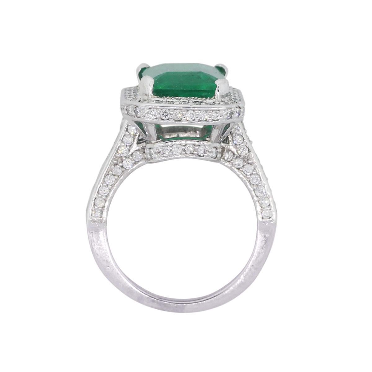 Material: 14k white gold
Gemstone Details: Emerald cut emerald approximately 4.16ct.
Additional Diamond Details: Approximately 1.90ctw of round brilliant diamonds, diamonds are H/I in color, SI in clarity
Ring Size: 6.75 (can be sized)
Measurements:
