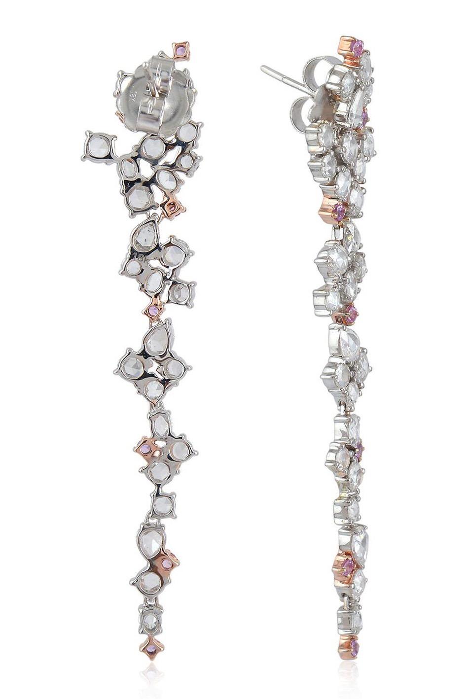 Handcrafted from 18-karat white gold, these exquisite drop earrings are set with 4.16 carats of rosecut diamonds and .6 carats pink sapphire.

FOLLOW  MEGHNA JEWELS storefront to view the latest collection & exclusive pieces.  Meghna Jewels is