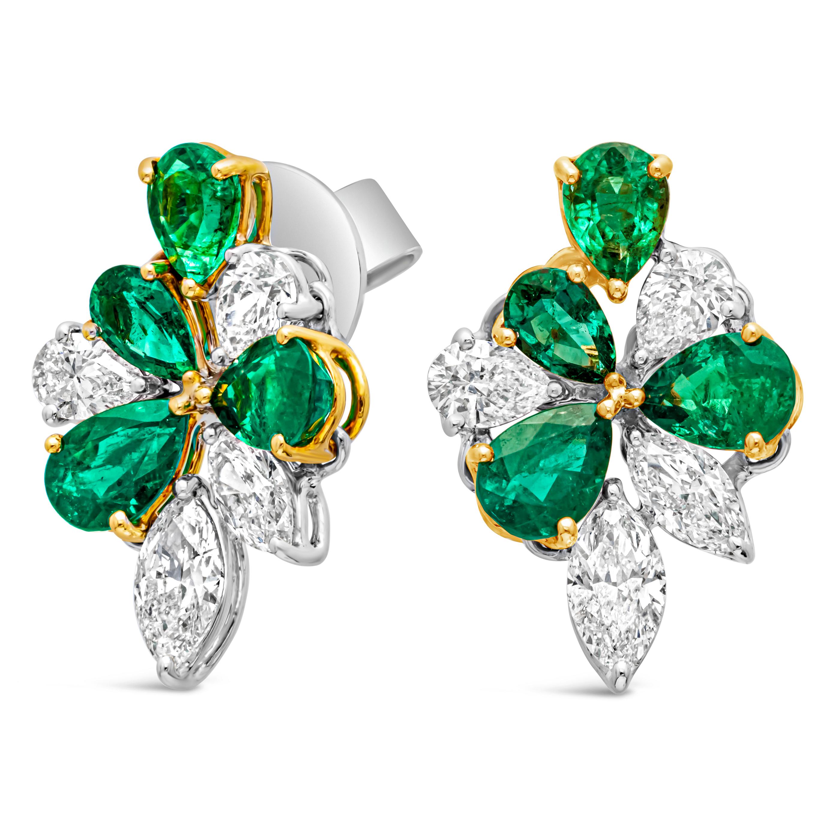An exquisite and fashionable pair of stud earrings showcasing a cluster of pear shape and marquise cut color-rich green emeralds and diamonds weighing 4.16 carats total. Set in a beautiful floral-motif cluster design and prong setting. Perfectly