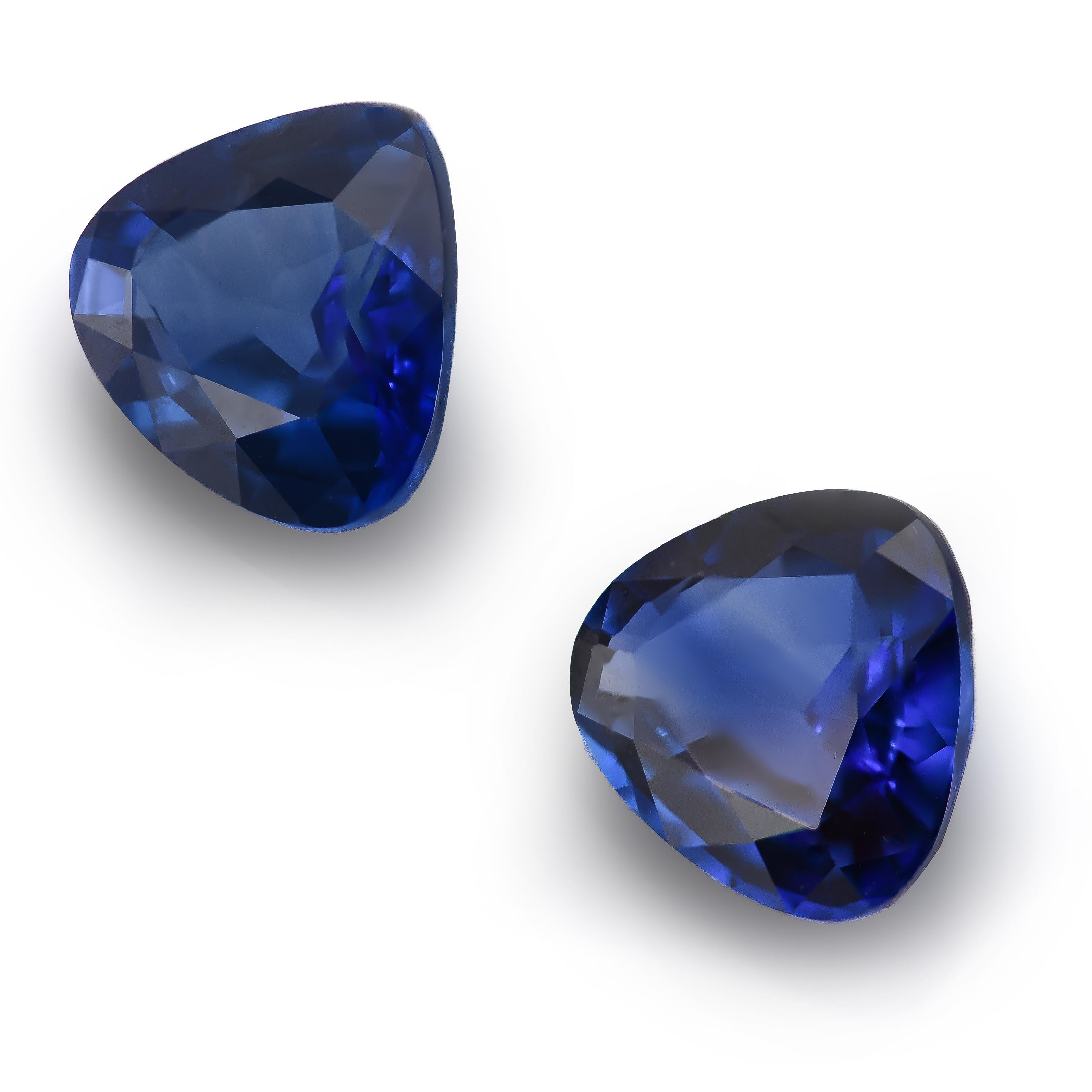 Introducing a dazzling Natural Blue Sapphire Pair totaling 4.17 carats. These pear-shaped gems, measuring 7.73 x 8.49 x 4.20 mm and 7.63 x 8.28 x 3.94 mm respectively, exhibit a brilliant/step cut that accentuates their captivating blue hue. While